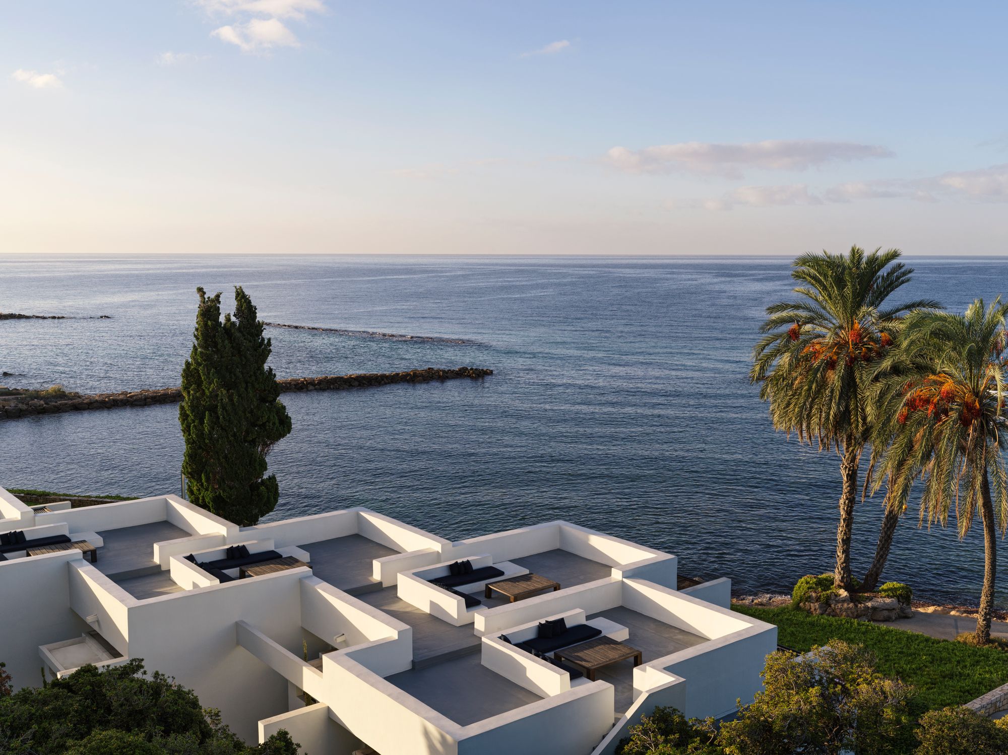 The contemporary suites at Almyra overlook the sea