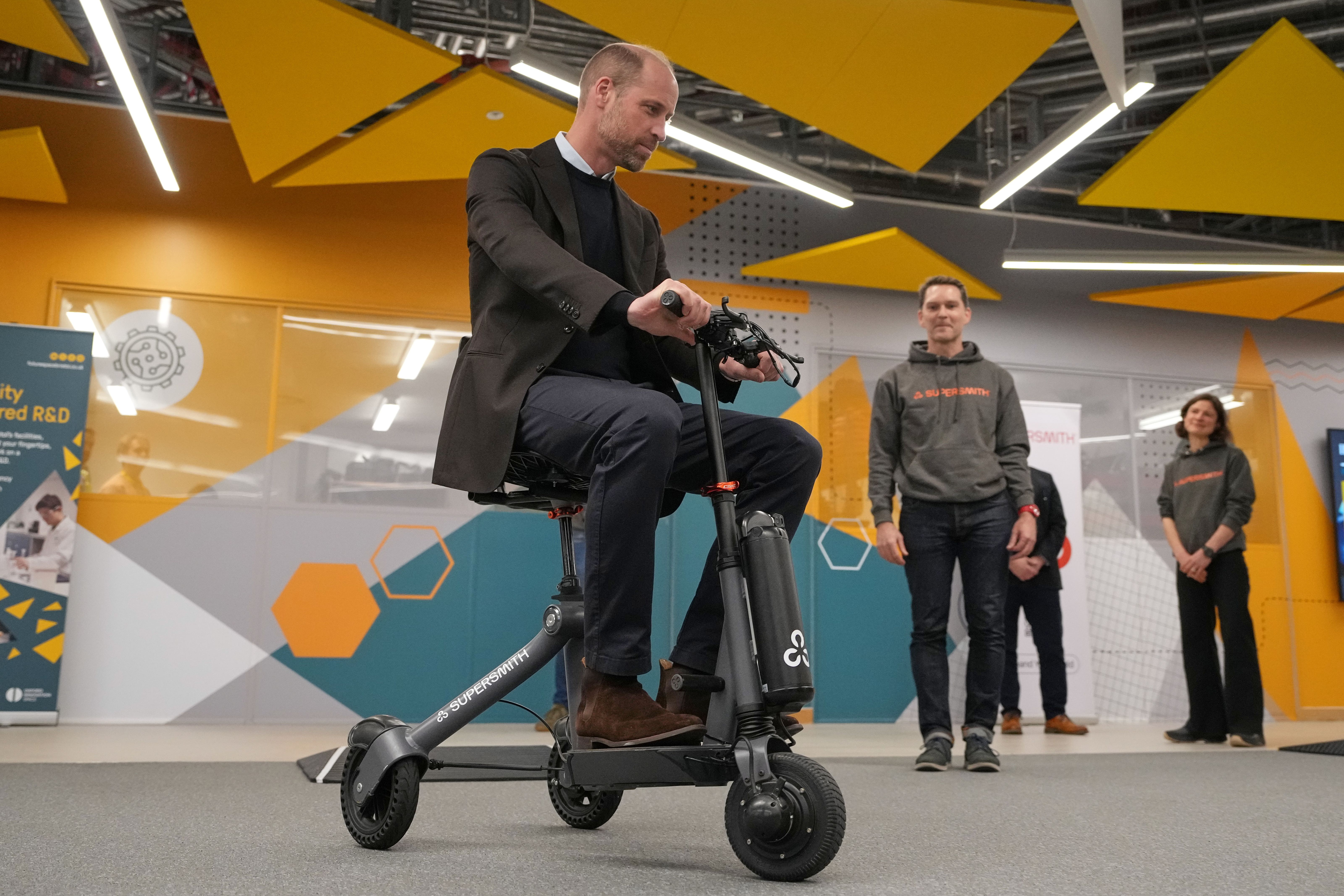 <p>William tries the lightweight mobility scooter during a visit to Bristol Robotics Laboratory (Alastair Grant/PA)</p>