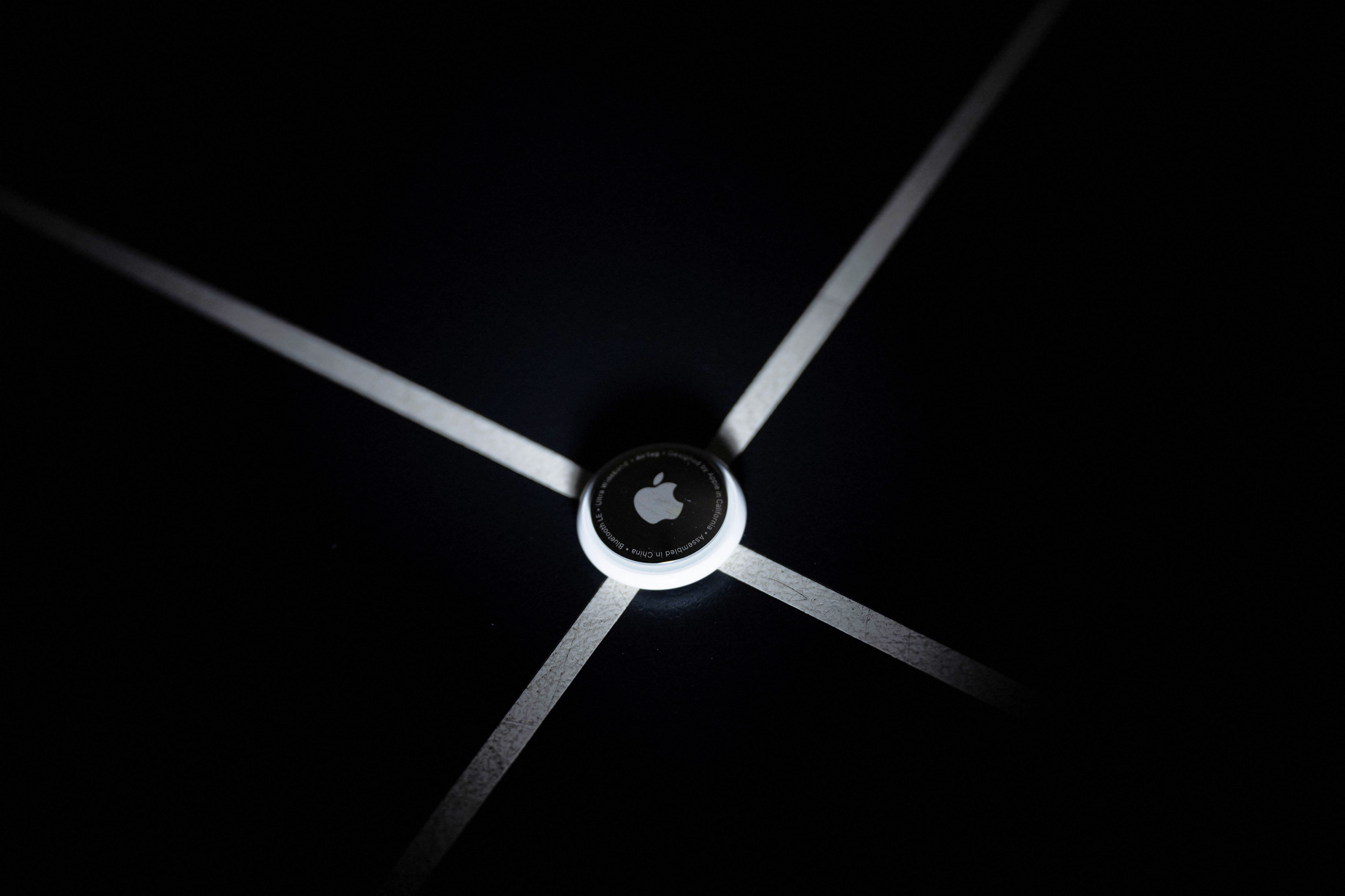 <p>An Apple AirTag pictured in Washington, DC on 13 February, 2023. A new AI device rumoured to be coming in 2026 will be roughly the same size as an AirTag</p>