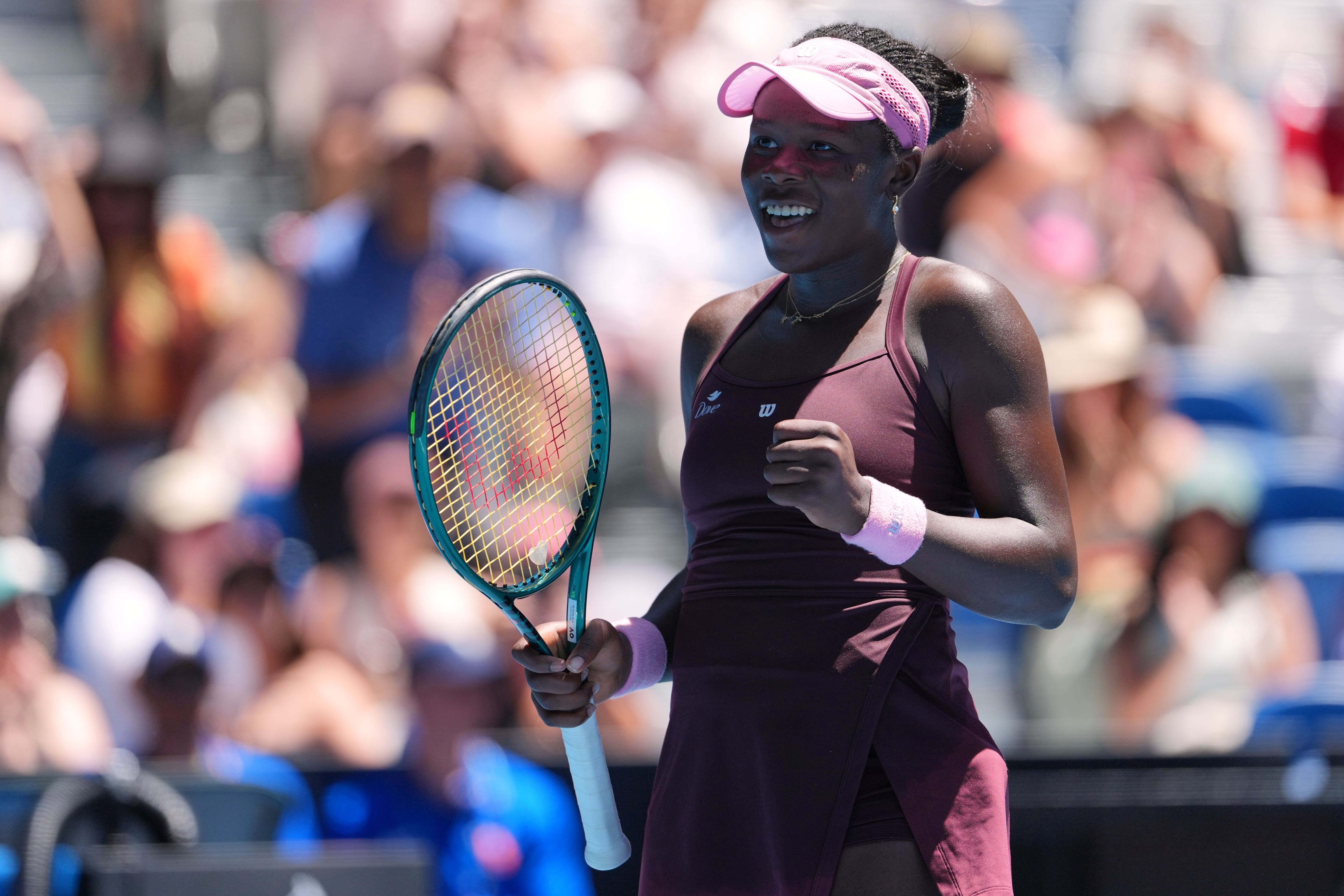 Victoria Mboko smiles after defeating Clara Tauson (Aaron Favila/AP)
