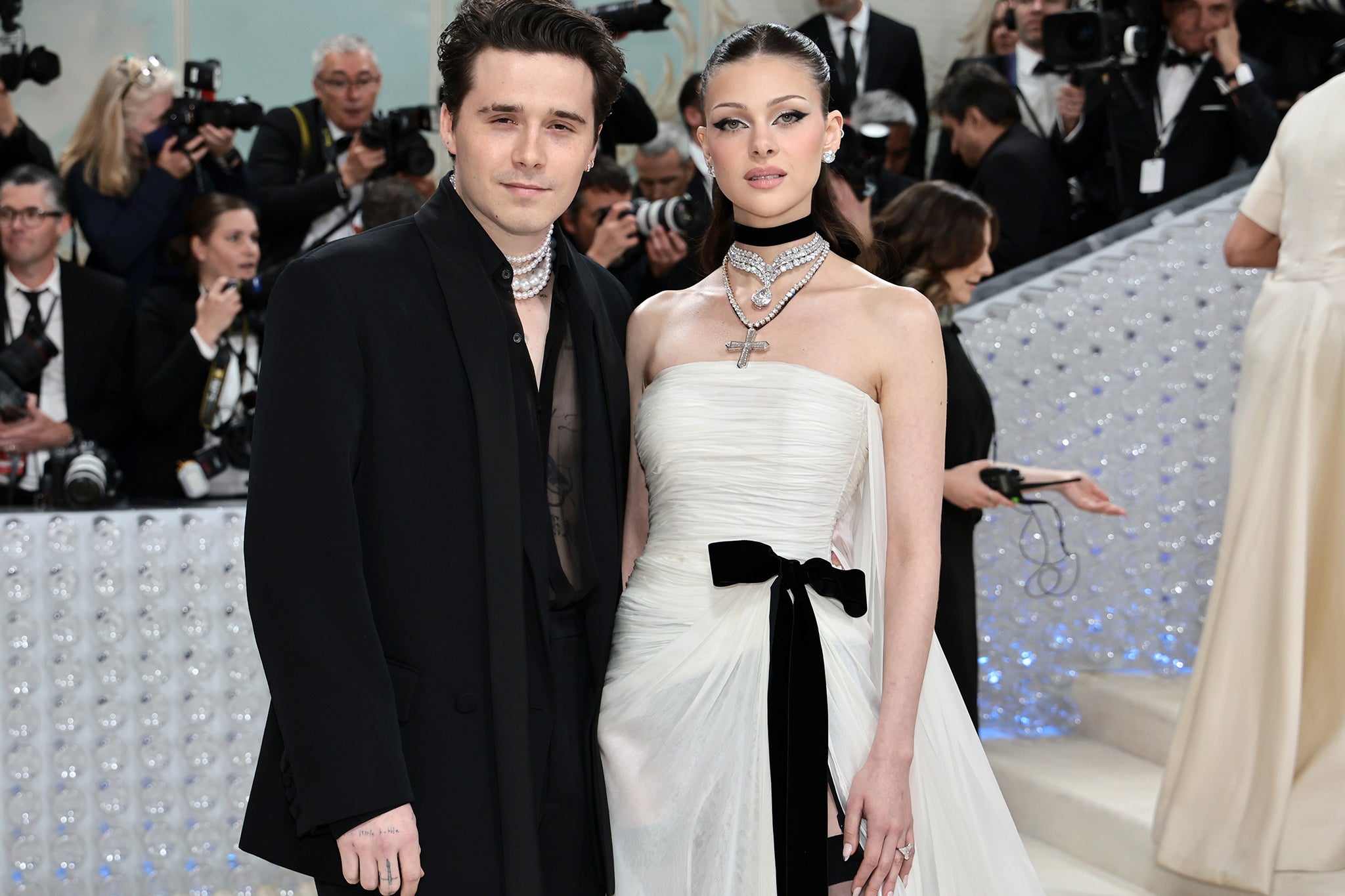 The US heiress Nicola Peltz did not wear her mother-in-law Victoria Beckham’s design for her 2022 wedding to Brooklyn Beckham, but instead a Valentino bridal gown with an epically large train and veil designed by its then creative director Pierpaolo Piccioli.