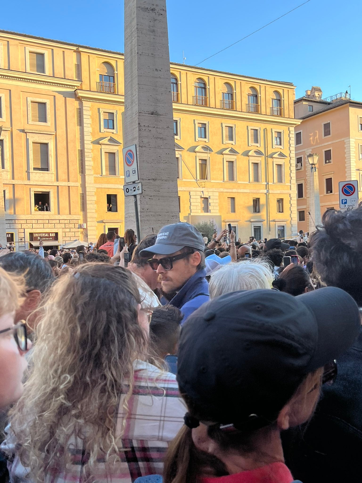 Harry Styles said the announcement of a new pope interrupted his haircut in Rome.