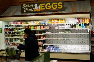 A customer walks past an empty shelf ahead of a winter storm in Nashville, Tennessee
