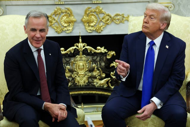 <p>U.S. President Donald Trump (R) speaks to reporters alongside Canadian Prime Minister Mark Carney in the Oval Office of the White House on October 07, 2025 in Washington, DC</p>