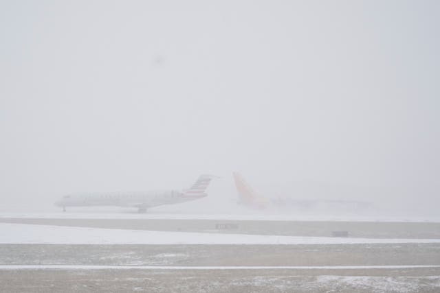 <p>Planes move on the tarmac at the Nashville International Airport during a winter storm </p>