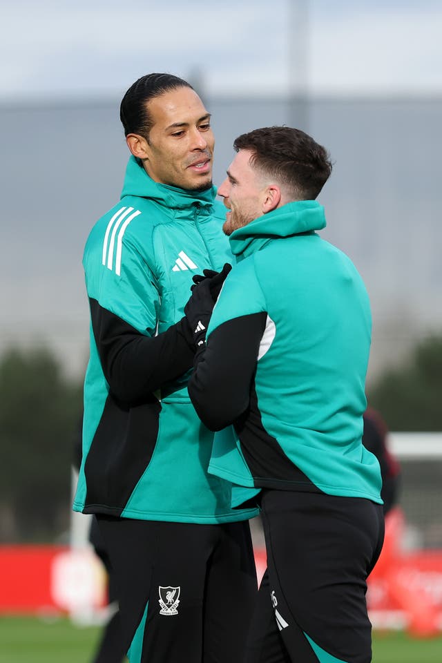 <p>Virgil van Dijk (left) has expressed his desire for Liverpool to keep Andy Robertson</p>