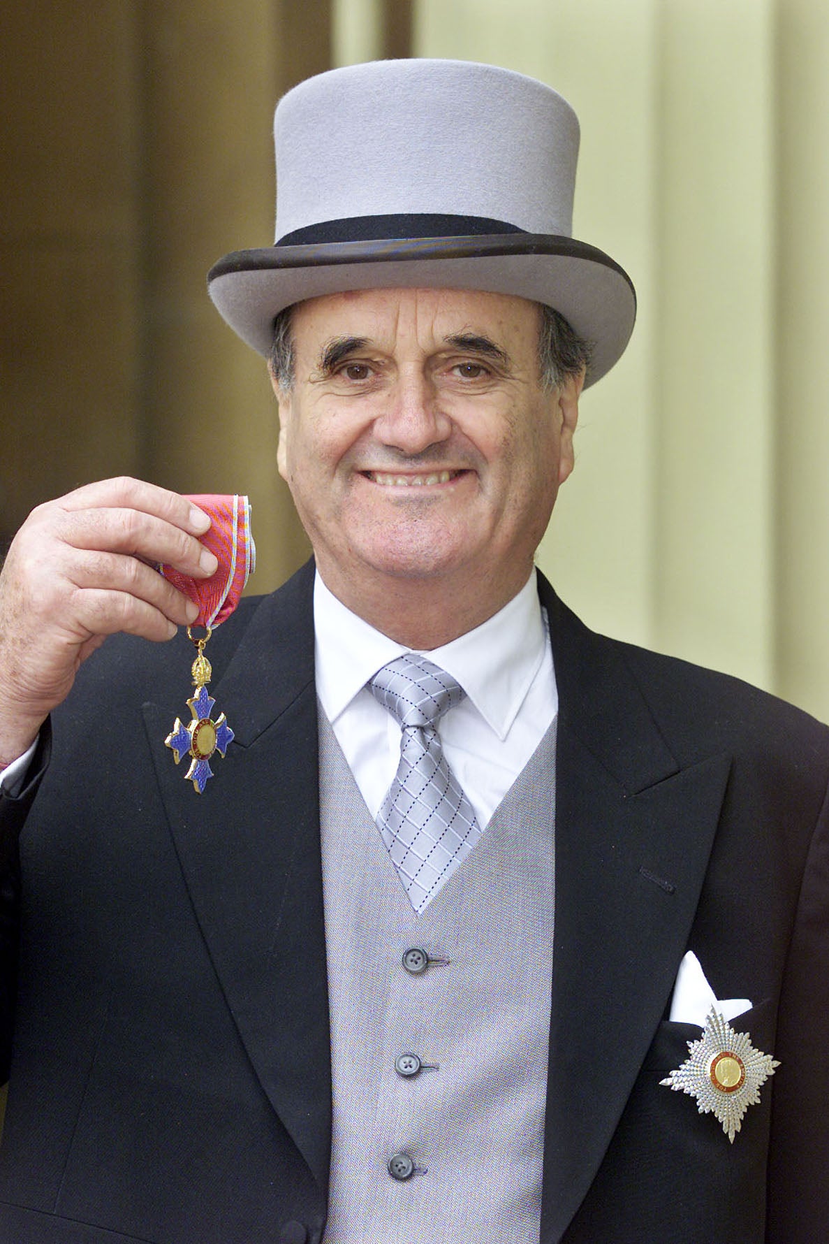 He was knighted in 2002 by the Prince of Wales, now the King, during a ceremony at Buckingham Palace