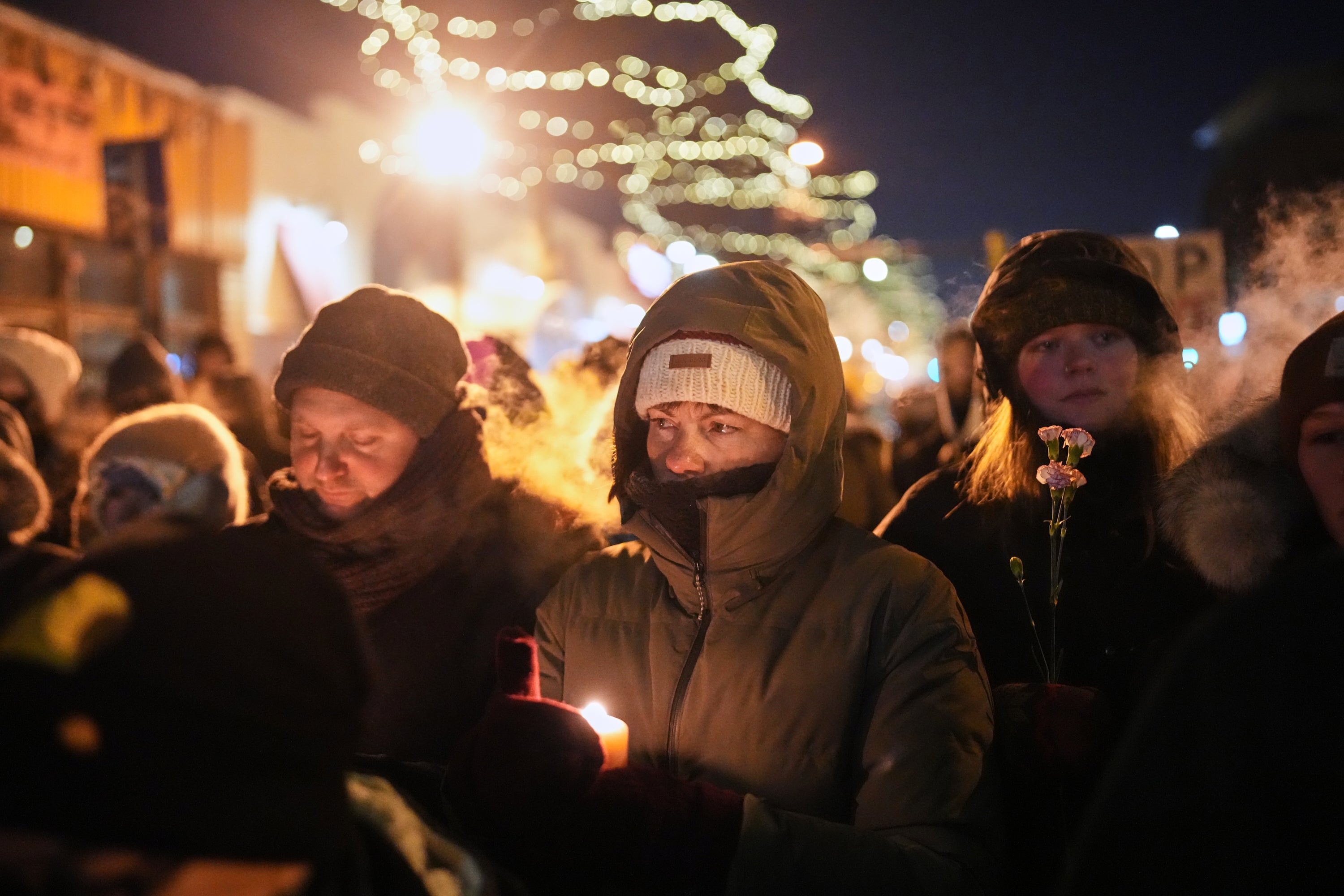 Minneapolis residents gathered Saturday night to hold a vigil for Alex Pretti, who was killed by a federal agent while protesting in Minneapolis