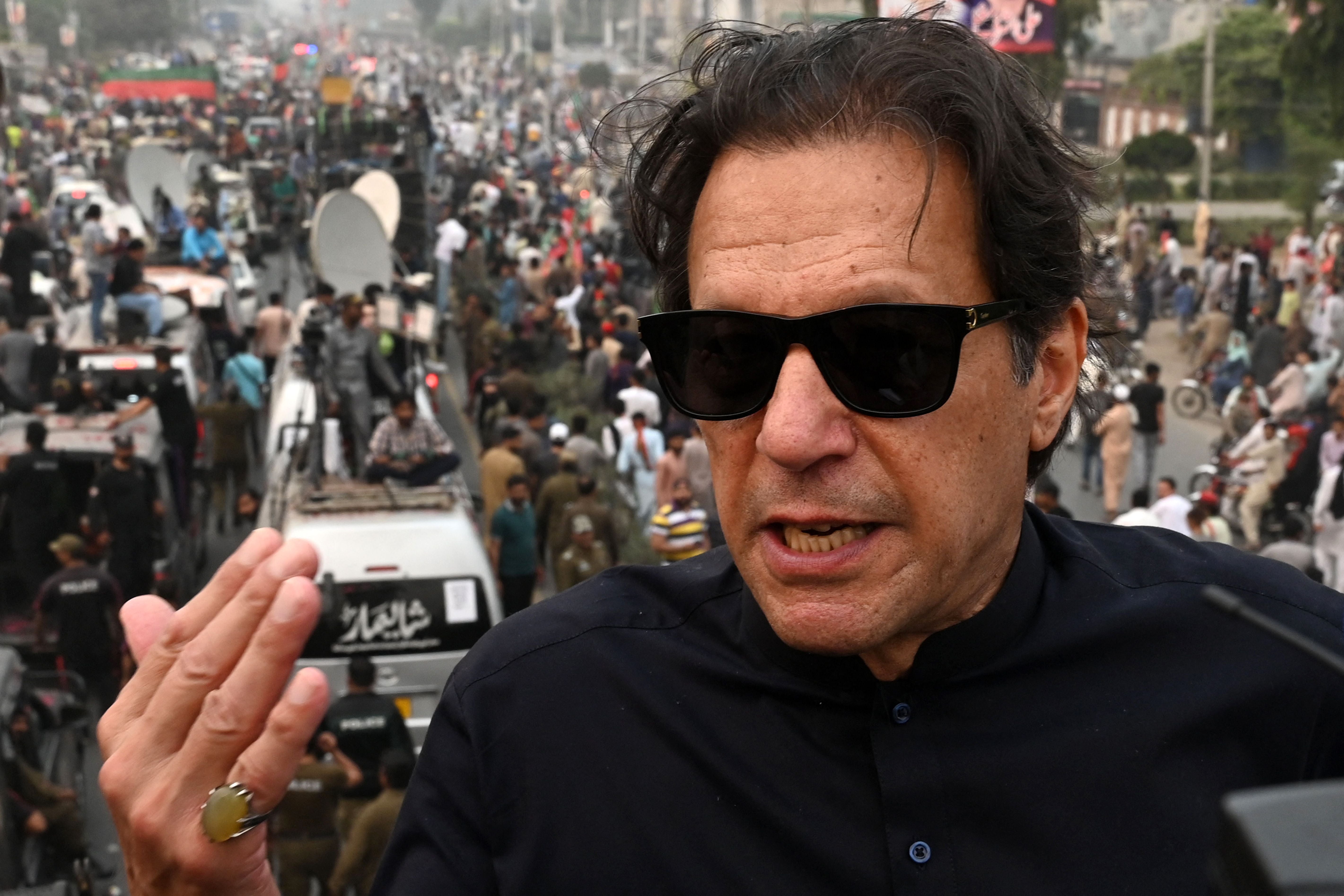 <p>Pakistan's former prime minister Imran Khan speaks while taking part in an anti-government march in Gujranwala in November 2022</p>