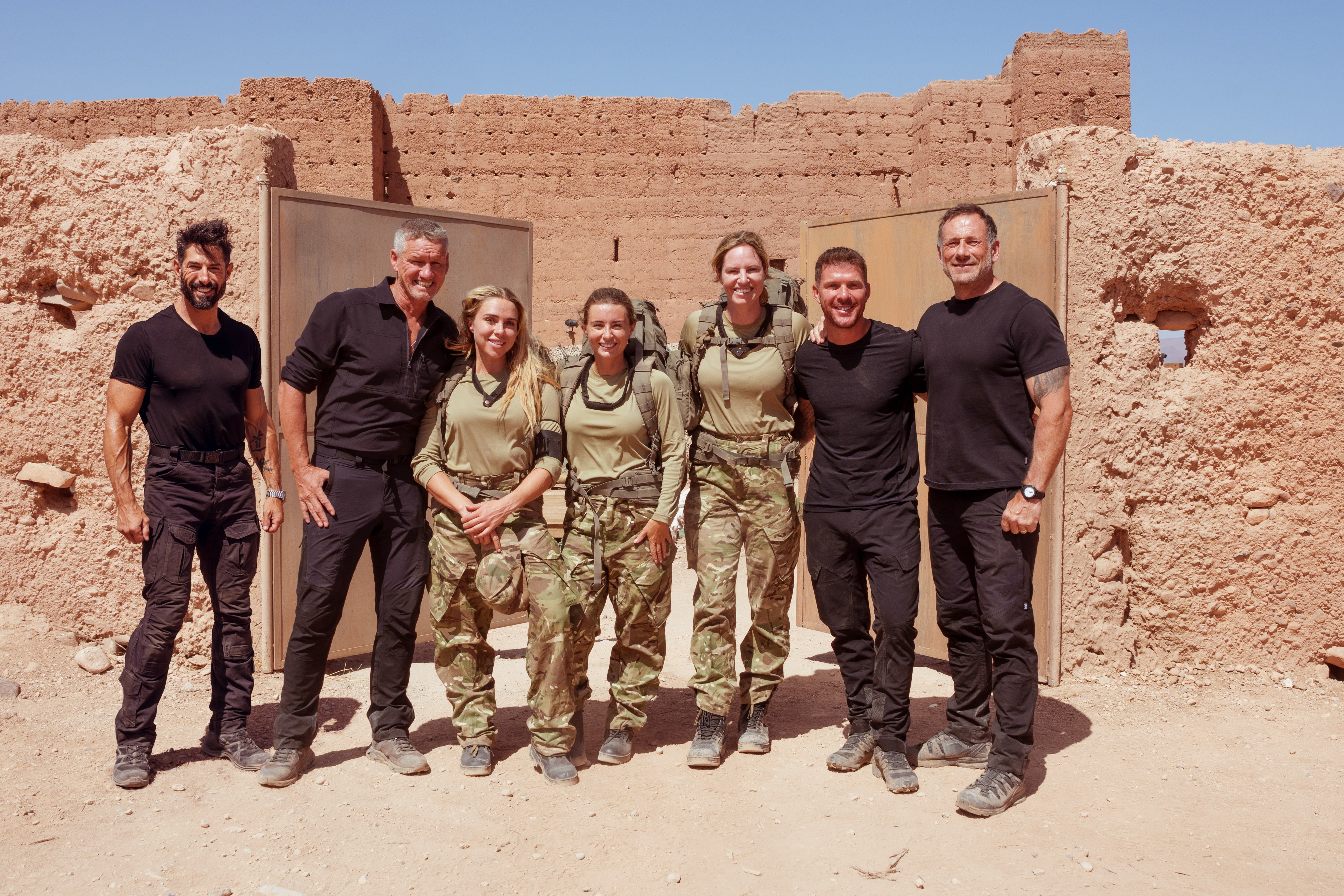 DS Rudy, DS Billy, Gabby Allen, Dani Dyer, Emily Seebohm, DS Chris and DS Foxy group shot after end of selection outside Parade Square gates in Celebrity SAS: Who Dares Wins