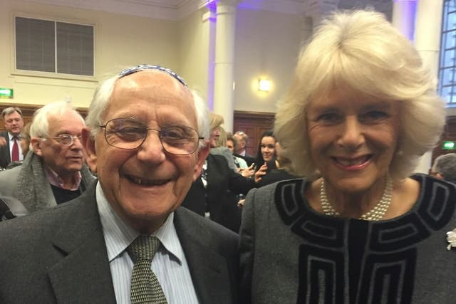 <p>Holocaust survivor Harry Olmer, who died two weeks ago aged 98, with Queen Camilla on Holocaust Memorial Day</p>