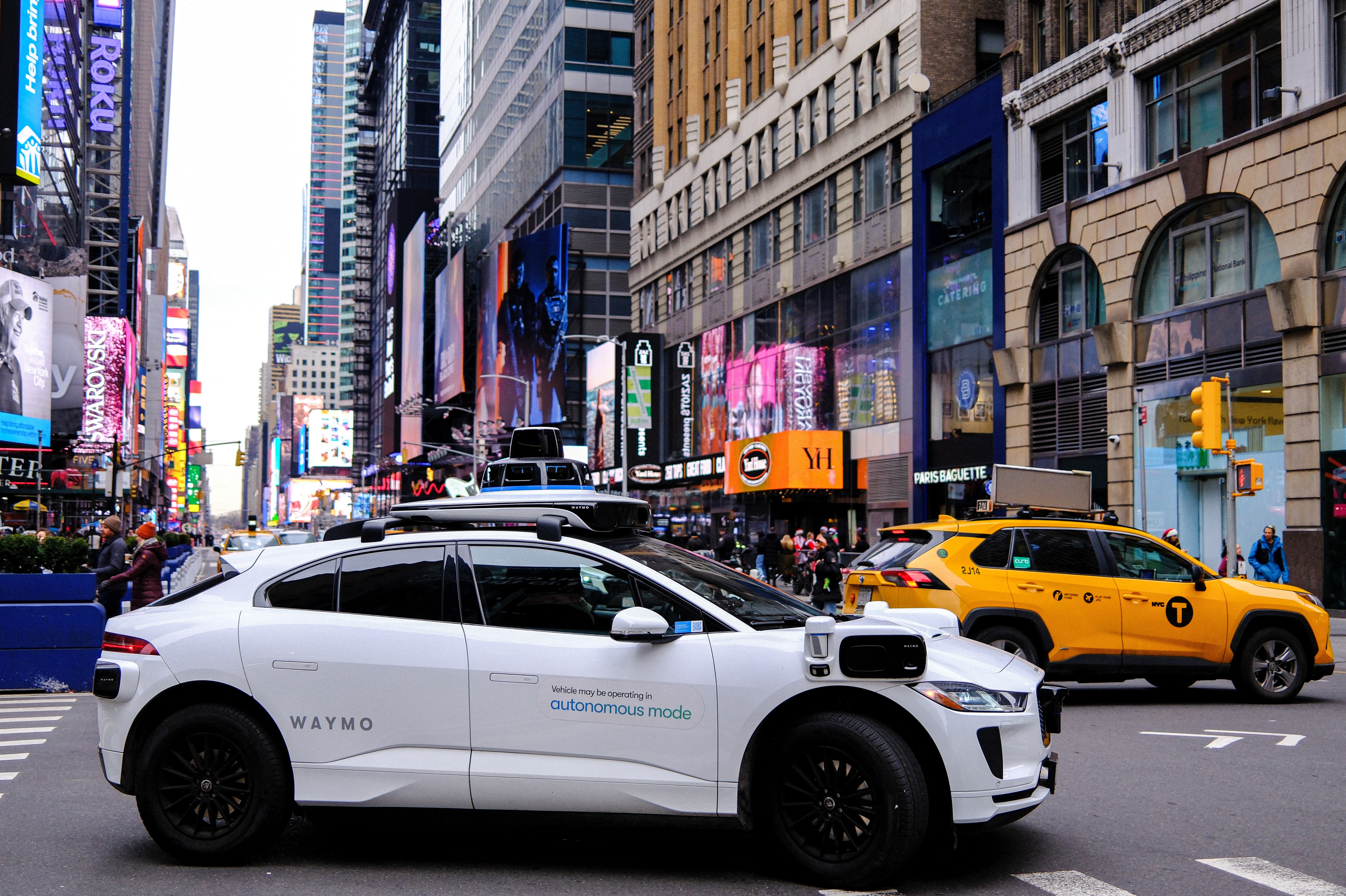 A Waymo autonomous self-driving electric vehicle in Manhattan on December 13, 2025. Self-driving taxis have not been implemented in New York City but former mayor Eric Adams did allow for a limited testing program