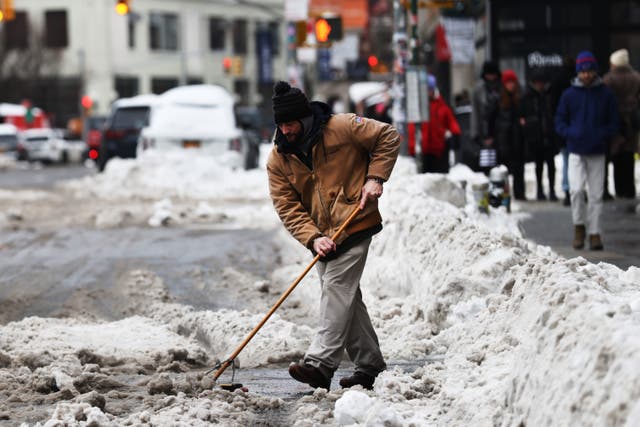 <p>A man shovels snow in Manhattan on Monday after a storm left nearly one foot of snow. Another snowstorm may hit parts of the U.S., spanning from the Gulf Coast up to the northeast , next weekend, according to weather models </p>