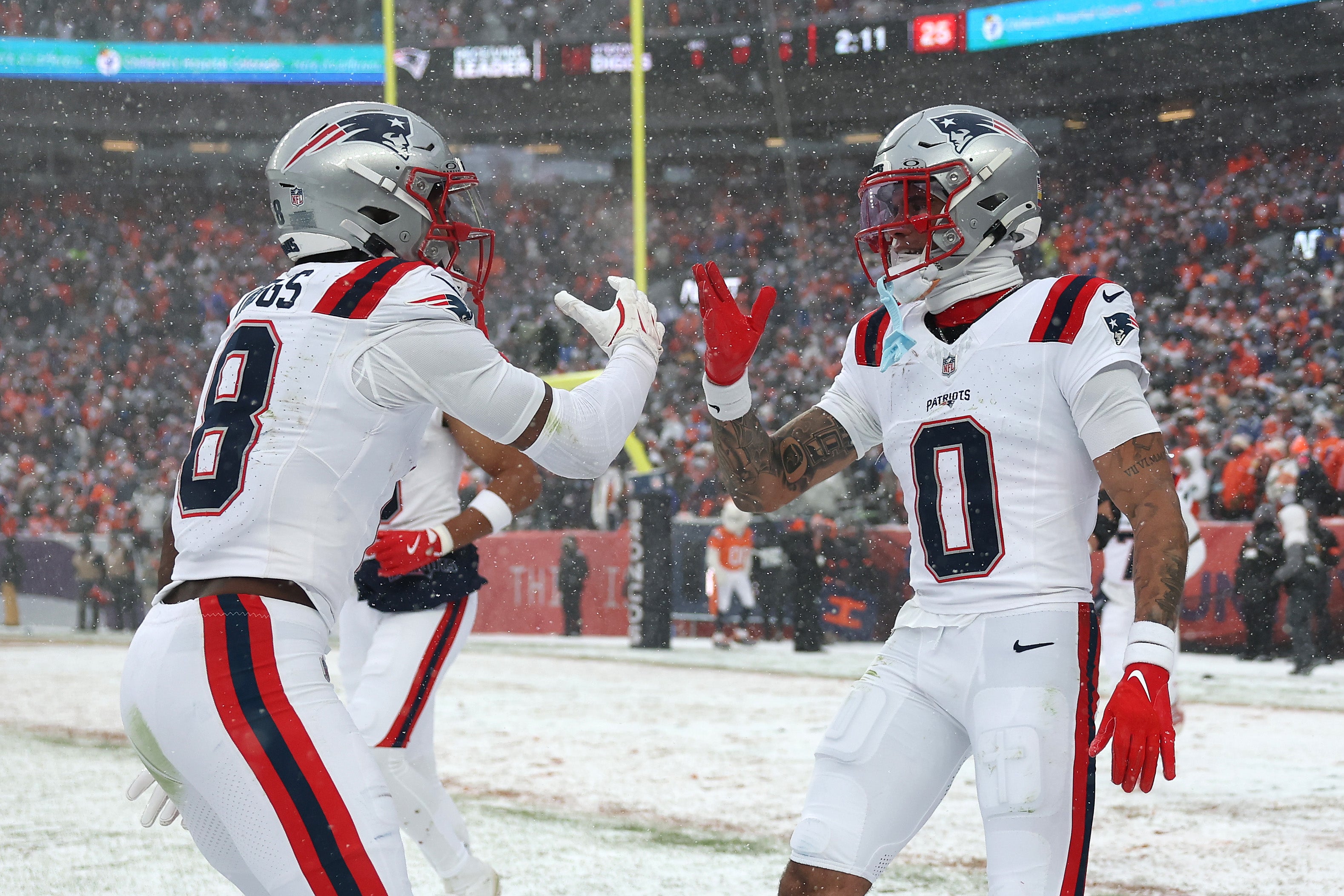 The Patriots survived snowy conditions to reach a record 12th Super Bowl