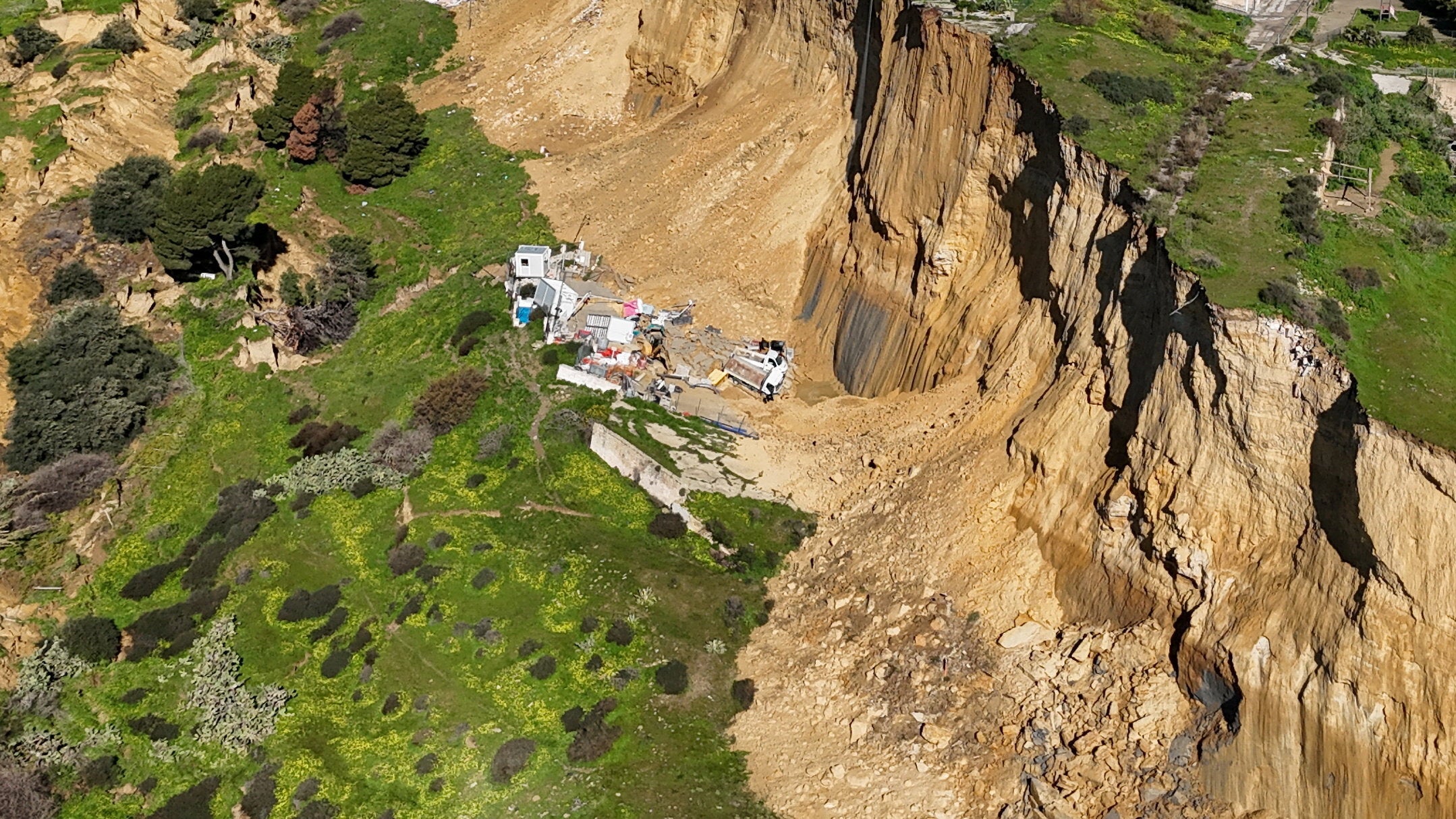 The aftermath of a landslide in Niscemi, Sicily, with some buildings and structures already collapsed