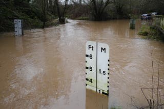 A river ford under several feet of water at Houndsfield Lane in Birmingham