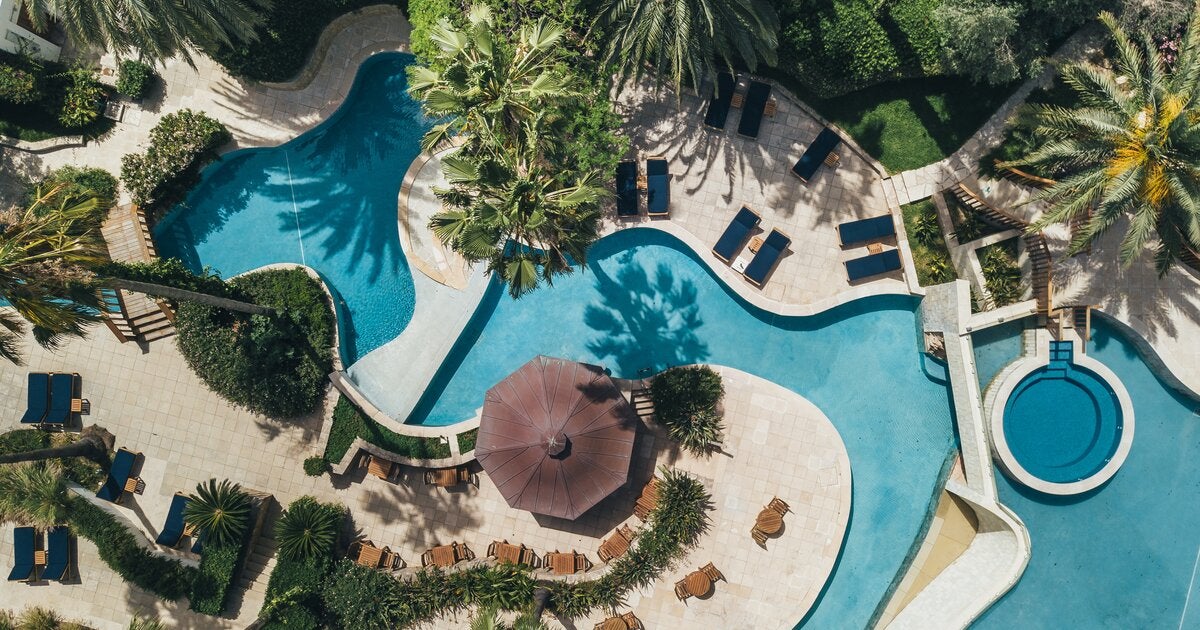 Annabelle’s lagoon-style pool weaves through the gardens