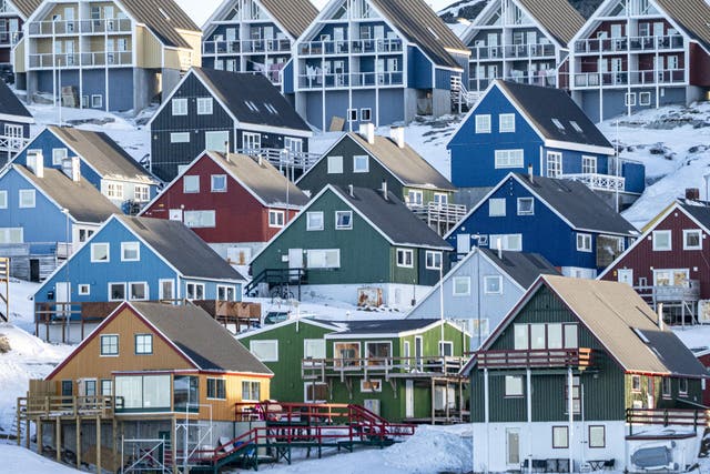 Houses on the coast of Nuuk, Greenland (Ben Birchall/PA)