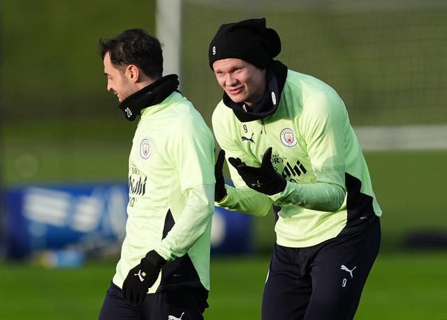 <p>Manchester City's Bernardo Silva (left) and Erling Haaland during a training session</p>