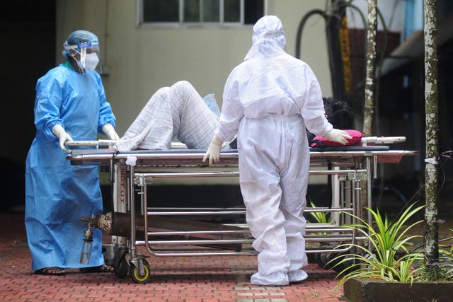 <p>File. Health workers shift a man with Nipah symptoms to an isolation ward at a hospital in the southern city of Kozhikode on 16 September 2023</p>