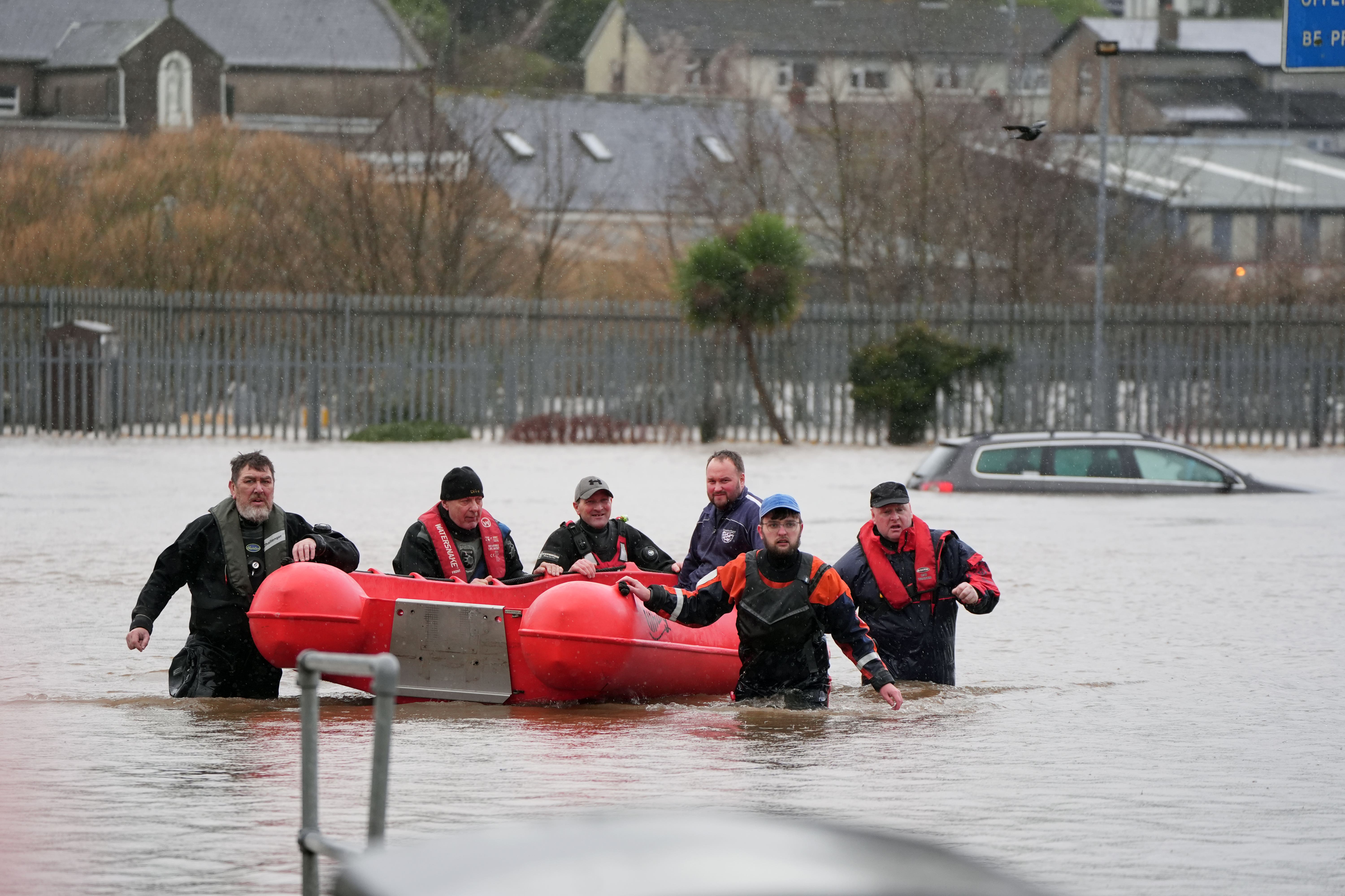 Members of Slaney Search and Rescue working in floodwater in Enniscorthy, Co Wexford (Niall Carson/PA)