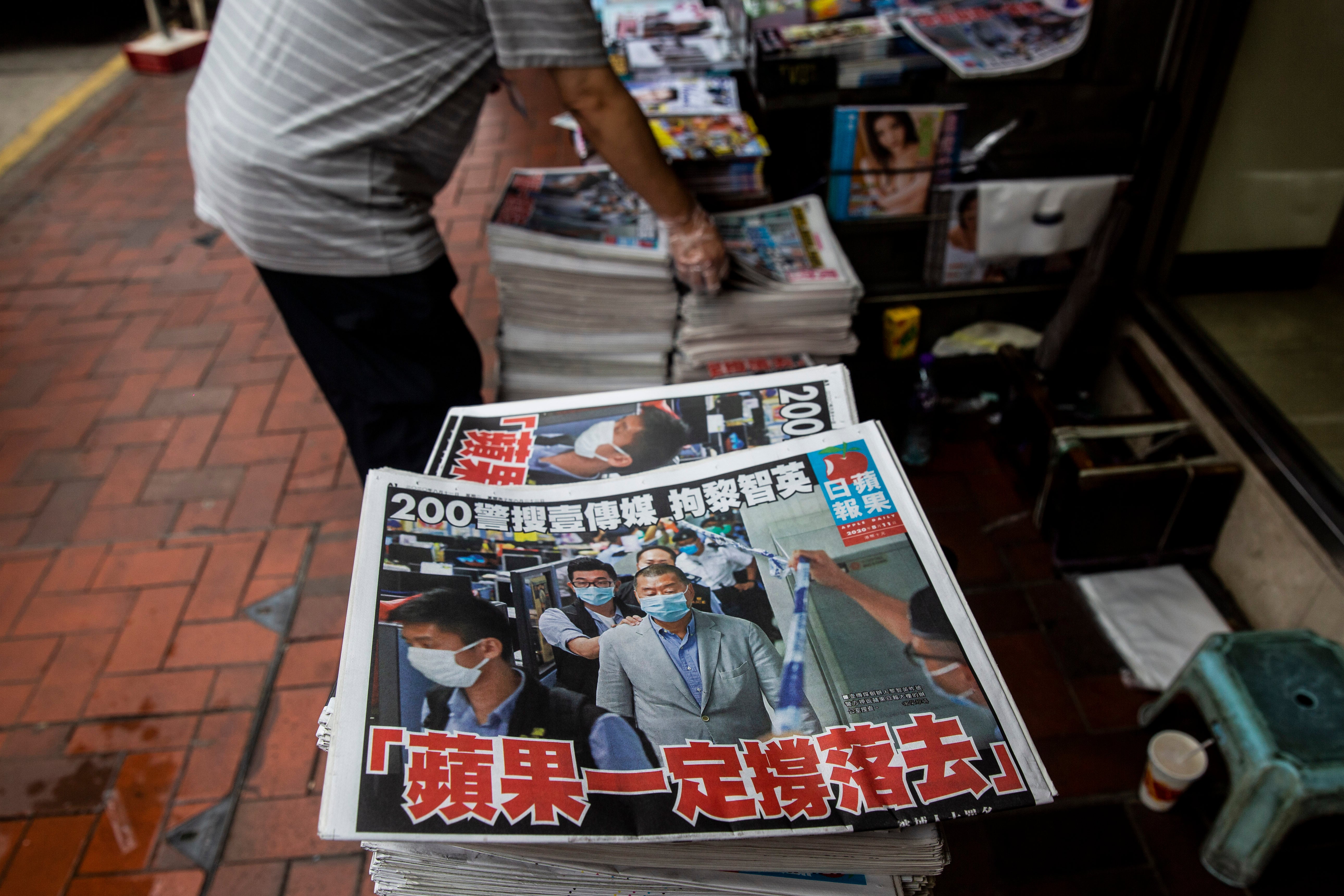 A newsstand sells copies of Apple Daily in Hong Kong in 2020