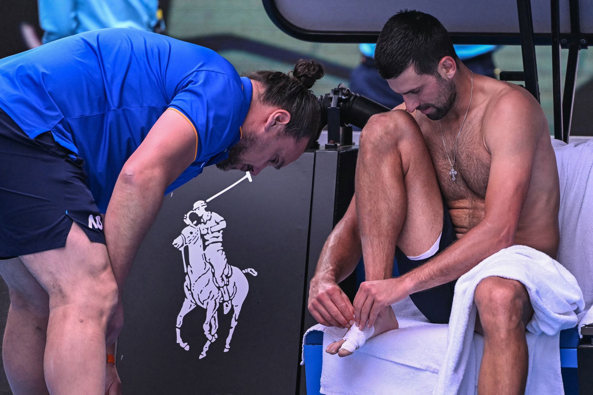 Novak Djokovic receives medical treatment