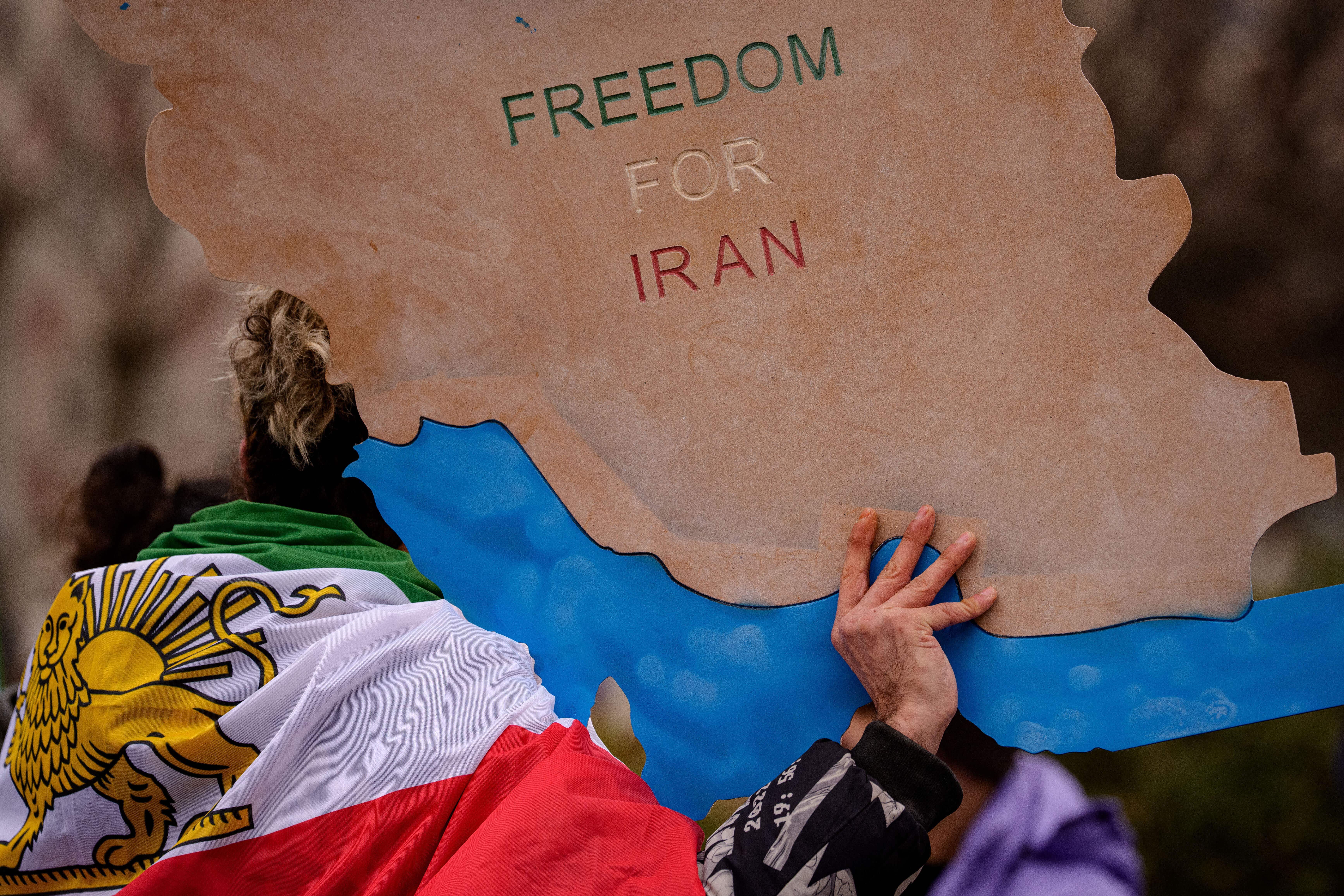 Protests have taken place around the world in support of the people of Iran who have faced a brutal crackdown by the Tehran regime (Andreea Alexandru/AP)