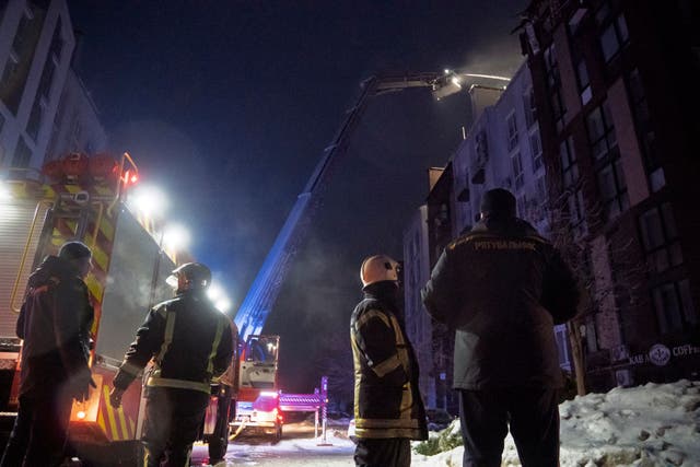 <p>Ukrainian rescuers work to extinguish a fire in a residential building following a drone attack in Bilohorodka, Kyiv region </p>