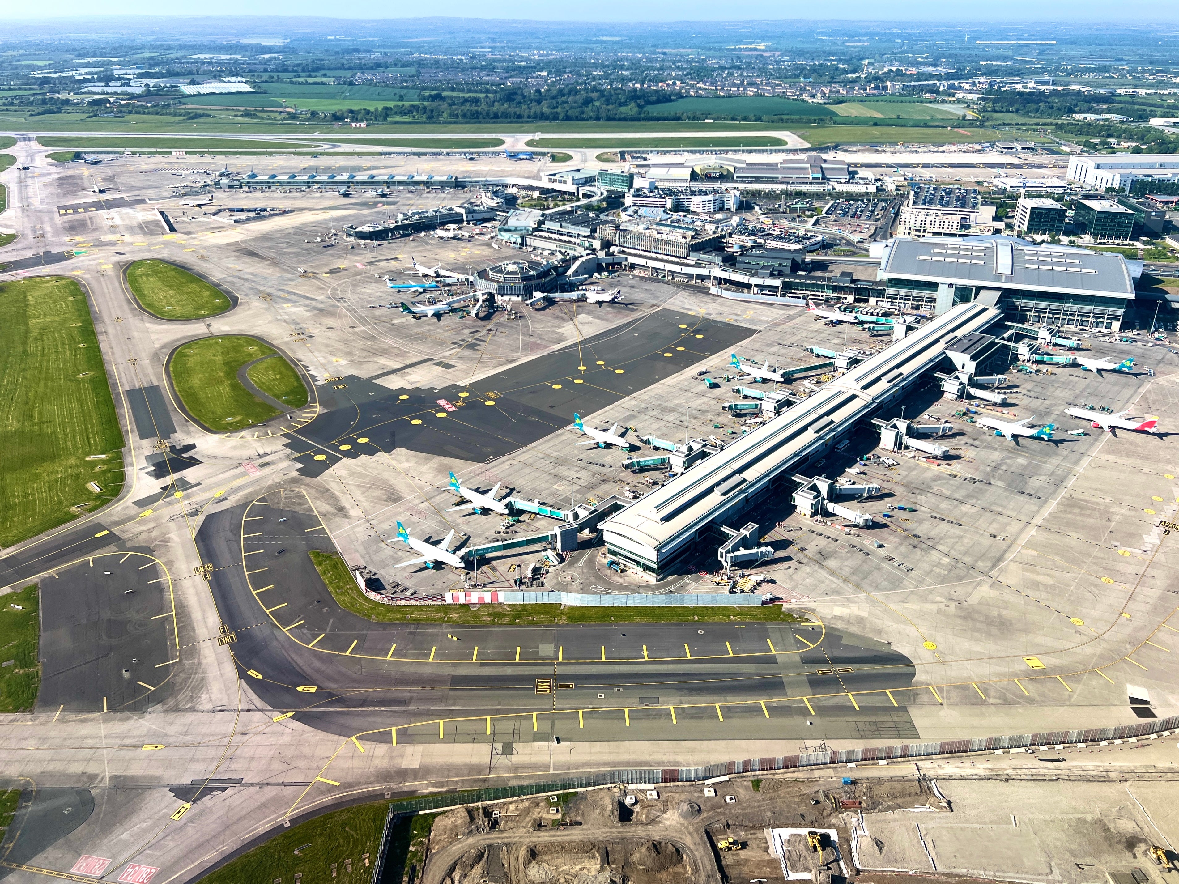 <p>Stopping off? Aer Lingus hub at Dublin airport, where passengers booked from Manchester are being offered connecting journeys rather than nonstops</p>