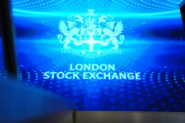The FTSE 100 index closed down 53.37 points (PA)