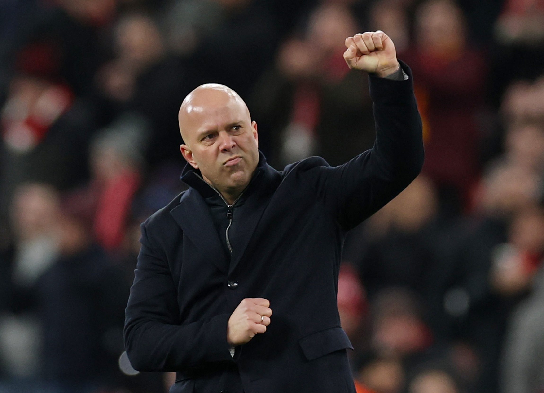 Arne Slot punches the air as he eased the pressure on his Liverpool job