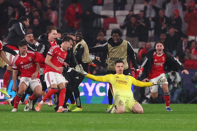 <p>Benfica's Anatoliy Trubin celebrates scoring their fourth goal and sending them into the play off round</p>
