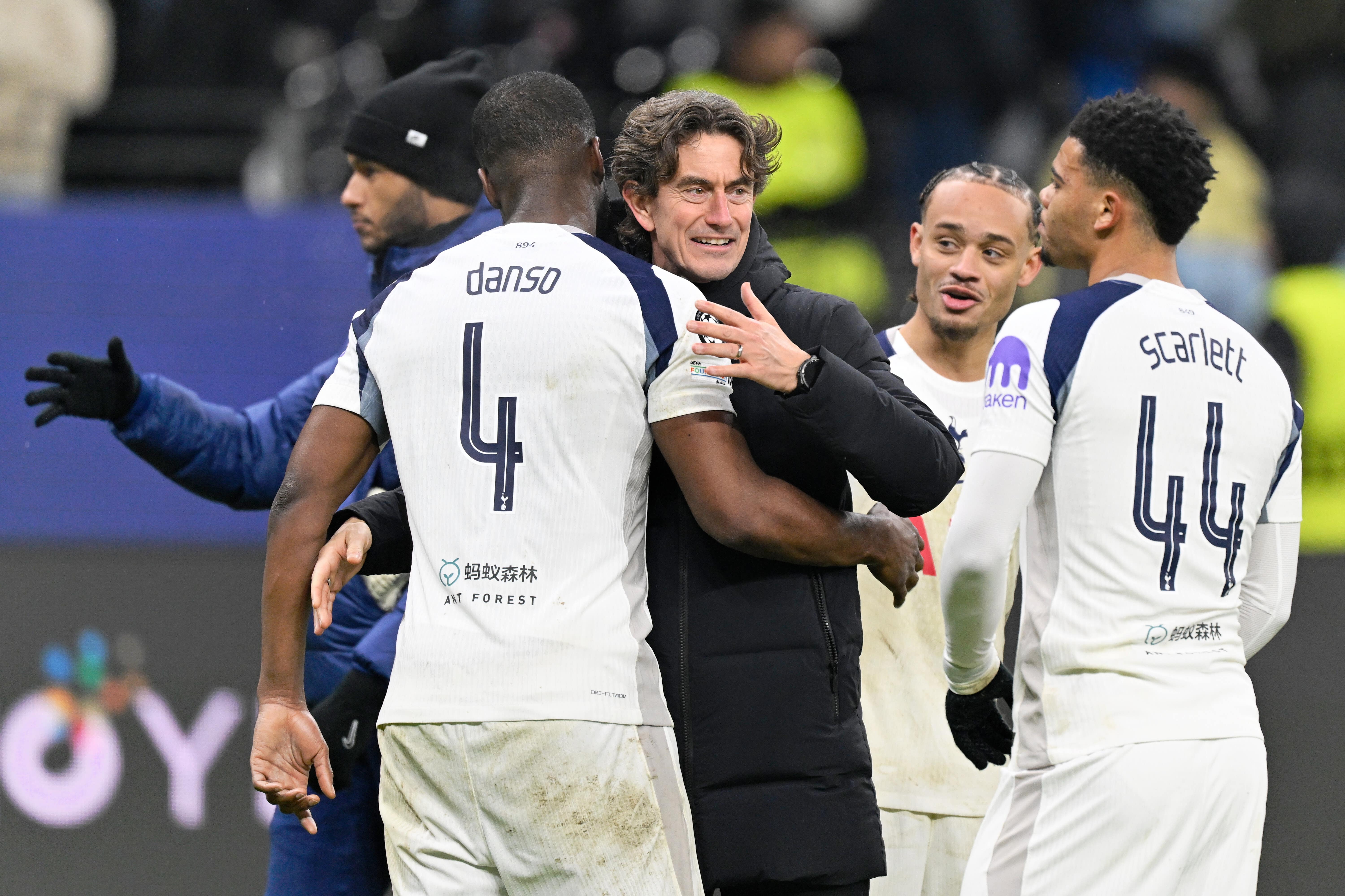 Thomas Frank celebrates with Kevin Danso after Tottenham’s 2-0 win over Eintracht Frankfurt (PA Wire via DPA)