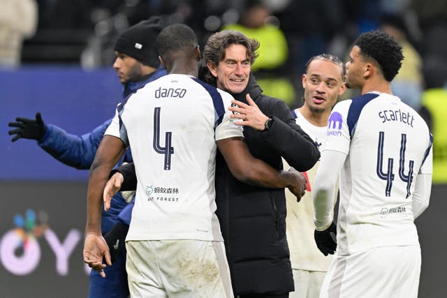 Thomas Frank celebrates with Kevin Danso after Tottenham’s 2-0 win over Eintracht Frankfurt (PA Wire via DPA)