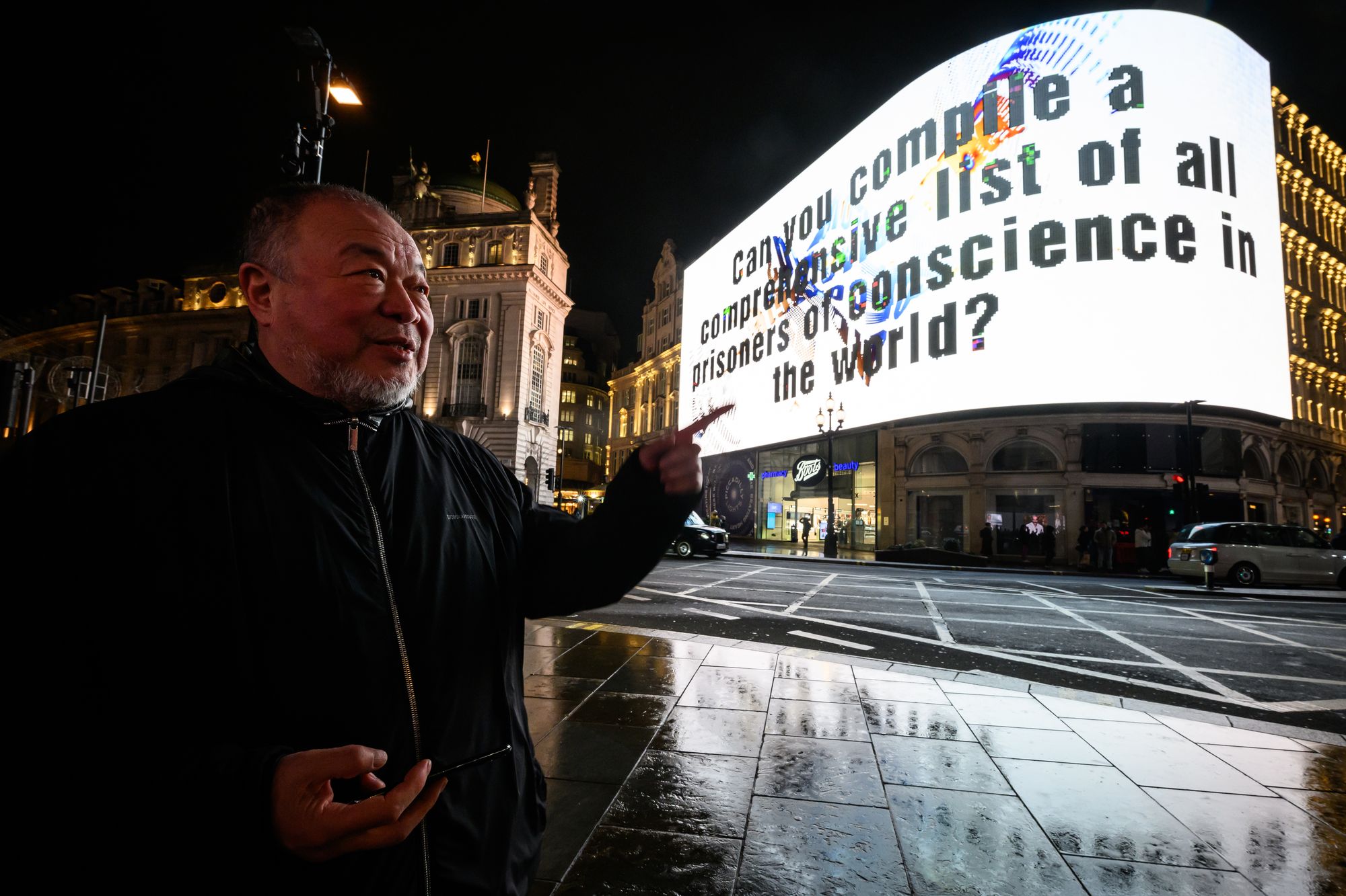 Ai Wei Wei at his installation in Piccadilly Circus in London