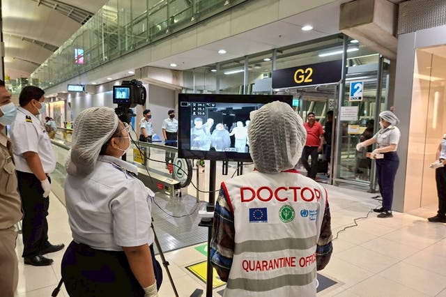 <p>Quarantine doctors watch thermal scanning of travelers from West Bengal, India at the Suvarnabhumi International Airport in Samut Prakarn, Thailand </p>