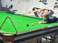 Two-year-old snooker prodigy sets world record with trick shot