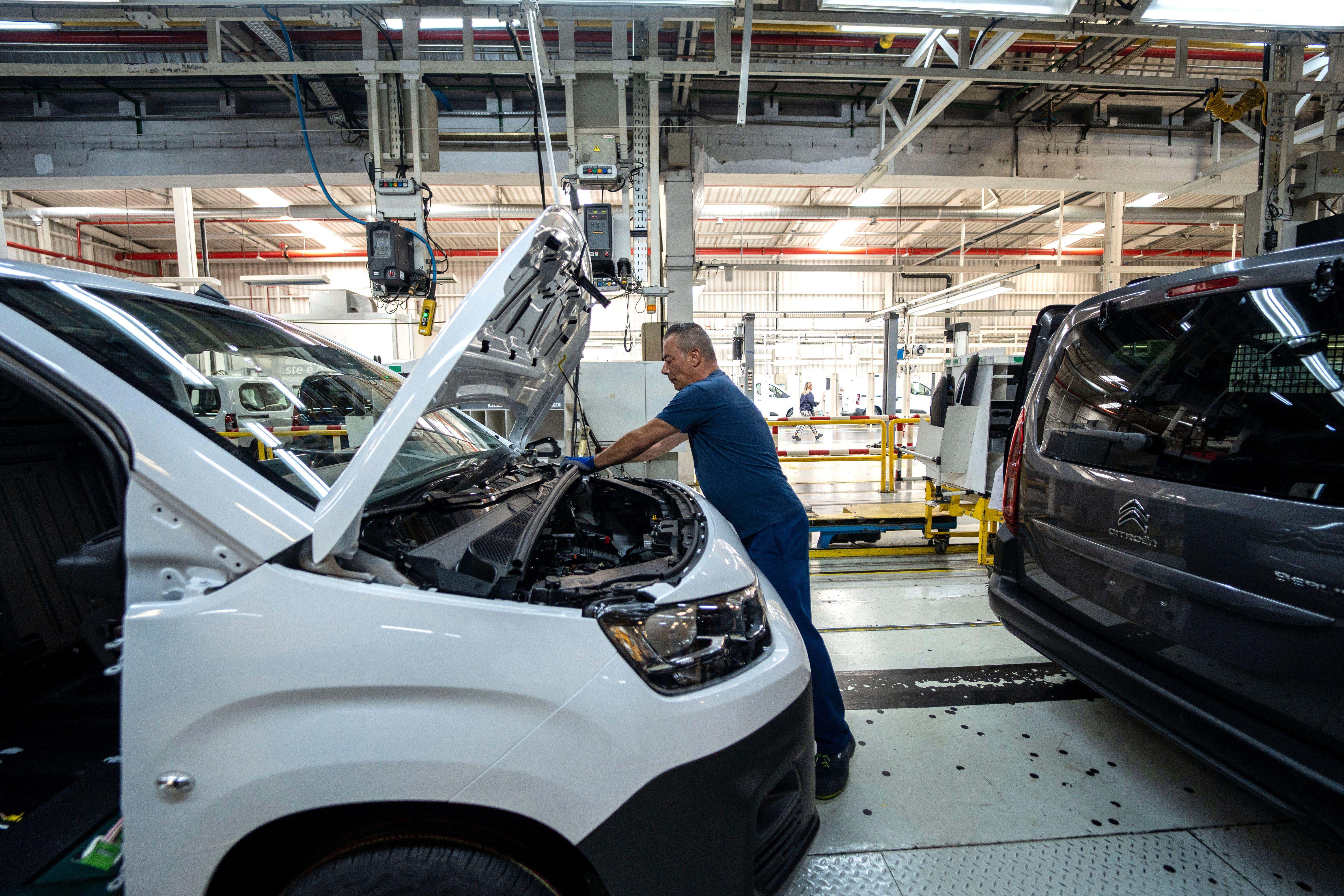 The Society of Motor Manufacturers and Traders said 717,371 cars and 47,344 commercial vehicles left factories in the UK over the year (Alamy/PA)