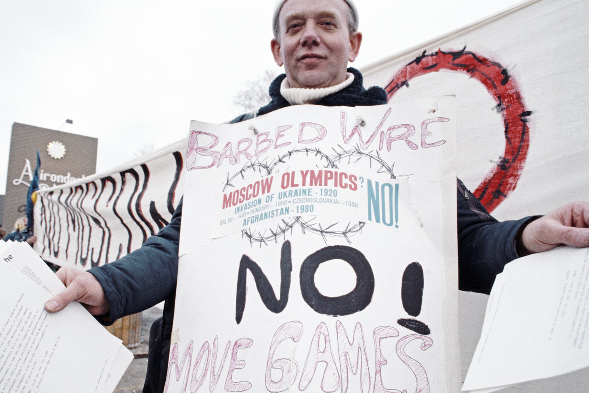 A protester against the Moscow Summer Olympics boycott during the Opening Ceremony for the XIII Olympic Winter Games on 14 February 1980 at the Lake Placid Equestrian Stadium, Lake Placid, United States.