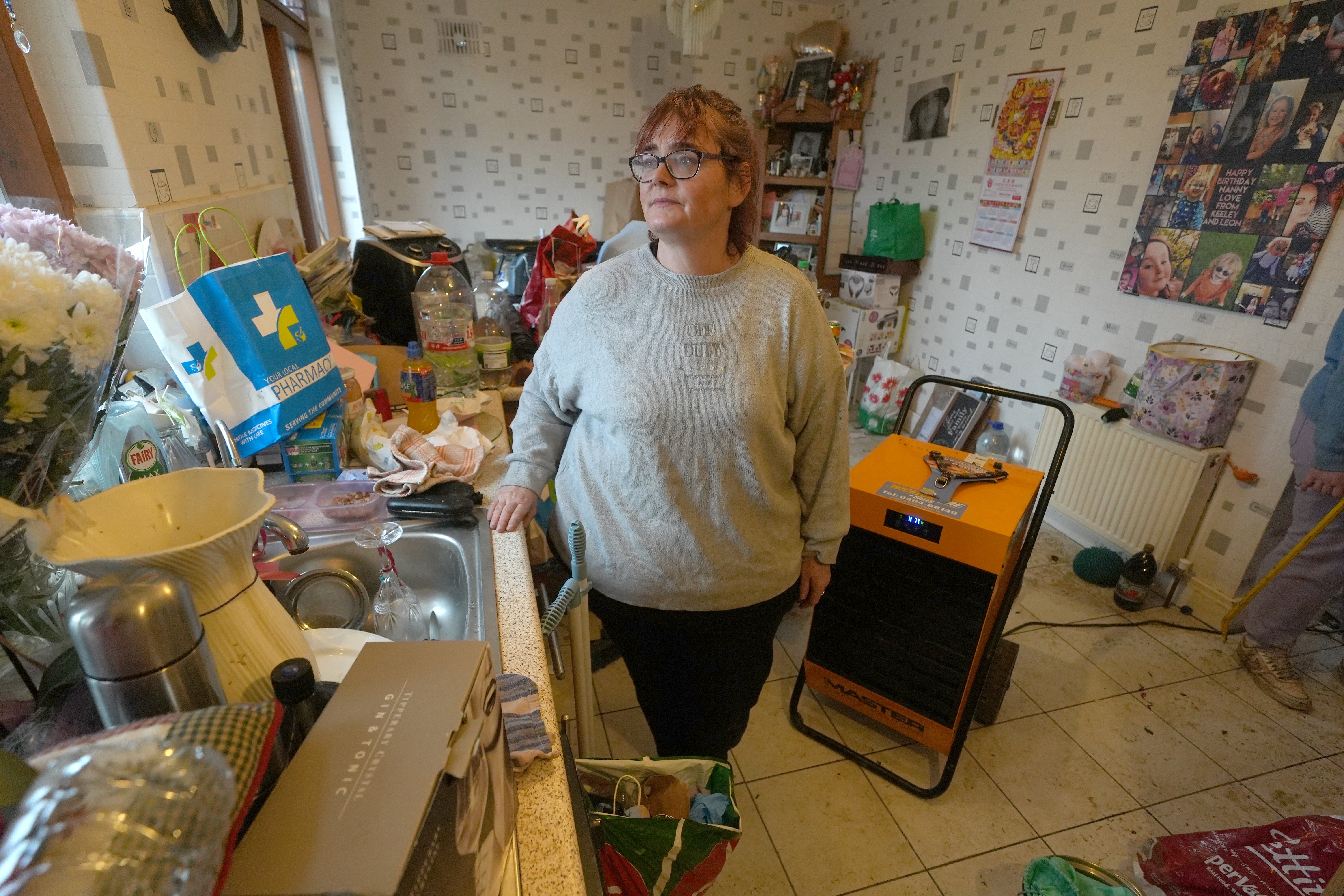 Elaine Byrne in her flooded home in Riverfield, Aughrim, Co Wicklow (Brian Lawless/PA)