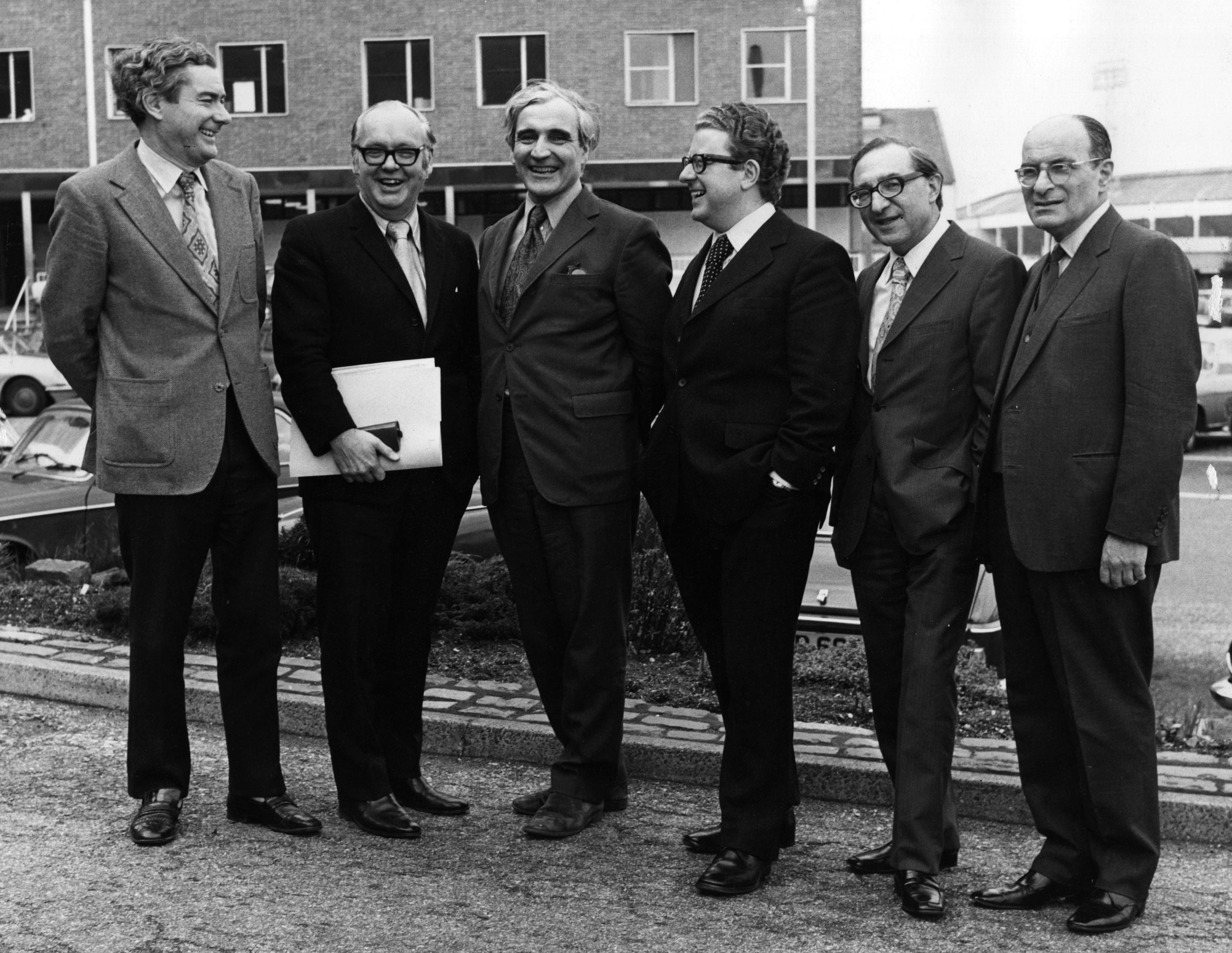 Radio and TV presenters for the General Election 1974 gather at the BBC Television Centre, Wood Lane, London. From left to right, they are Alastair Burnet, the main BBC TV presenter, Robert McKenzie, David Butler, Alan Watson, Hardiman Boott, and Russian Service Commentator Anatol Goldberg. (Photo by Fox Photos/Getty Images)