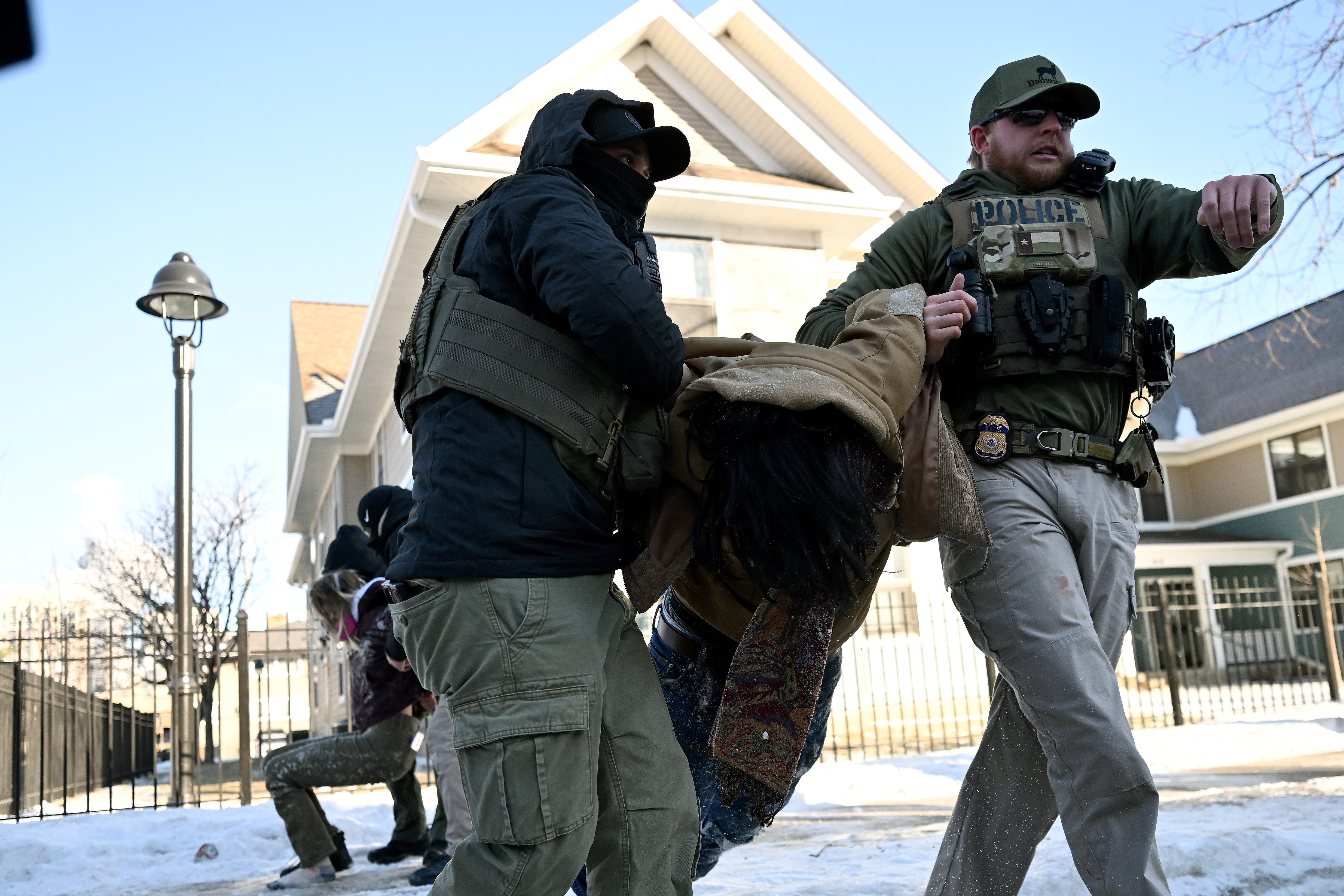 <p>Federal agent detain two people at Portland Ave and 19th St. on January 29, 2026 in Minneapolis, Minnesota</p>