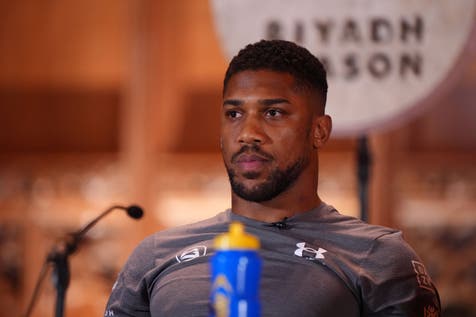 <p>Eddie Hearn believes Anthony Joshua will fight again (Bradley Collyer/PA)</p>