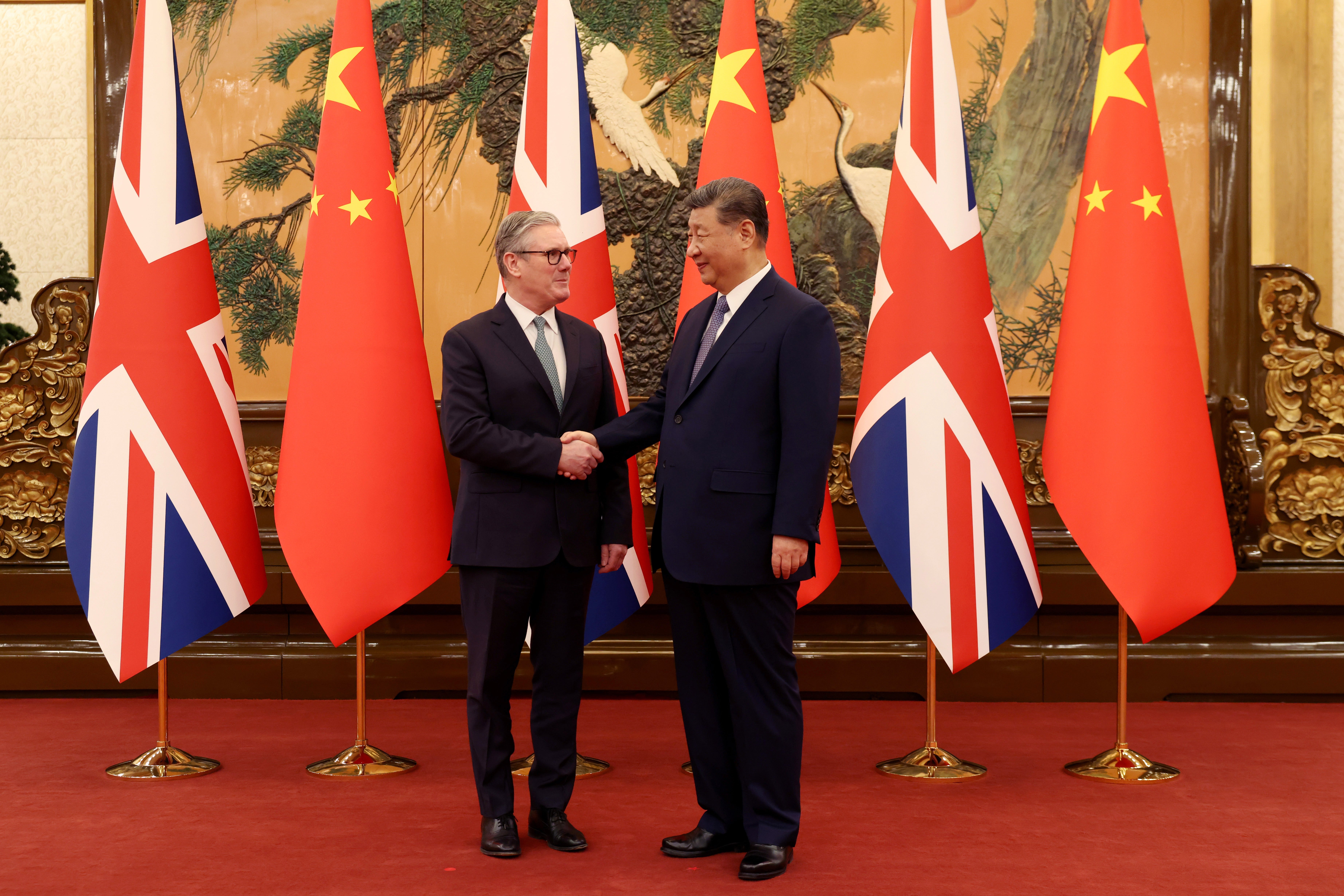 Keir Starmer and Xi Jinping pictured at the Great Hall of the People