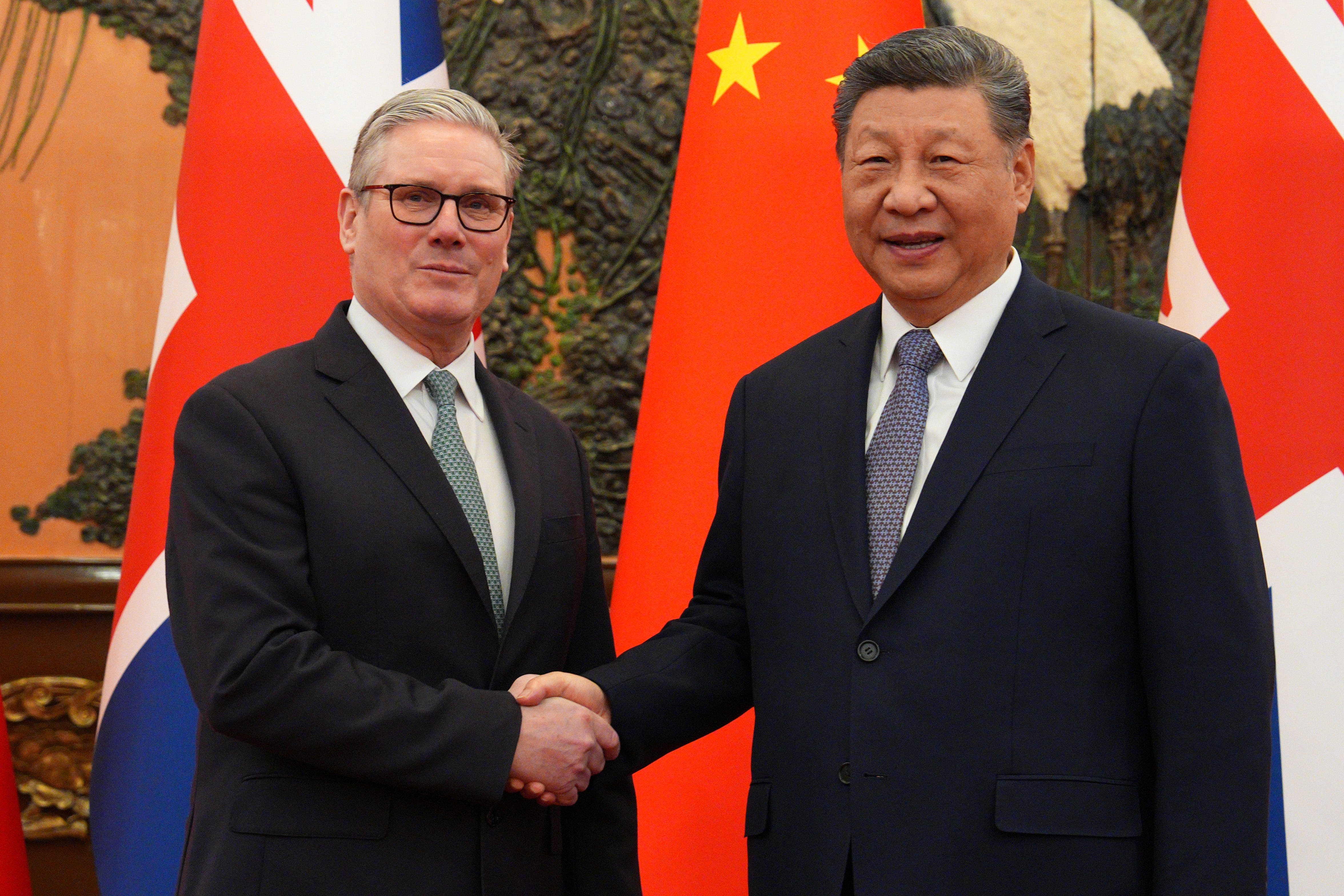 Keir Starmer shakes hands with Xi Jinping during his trip to China