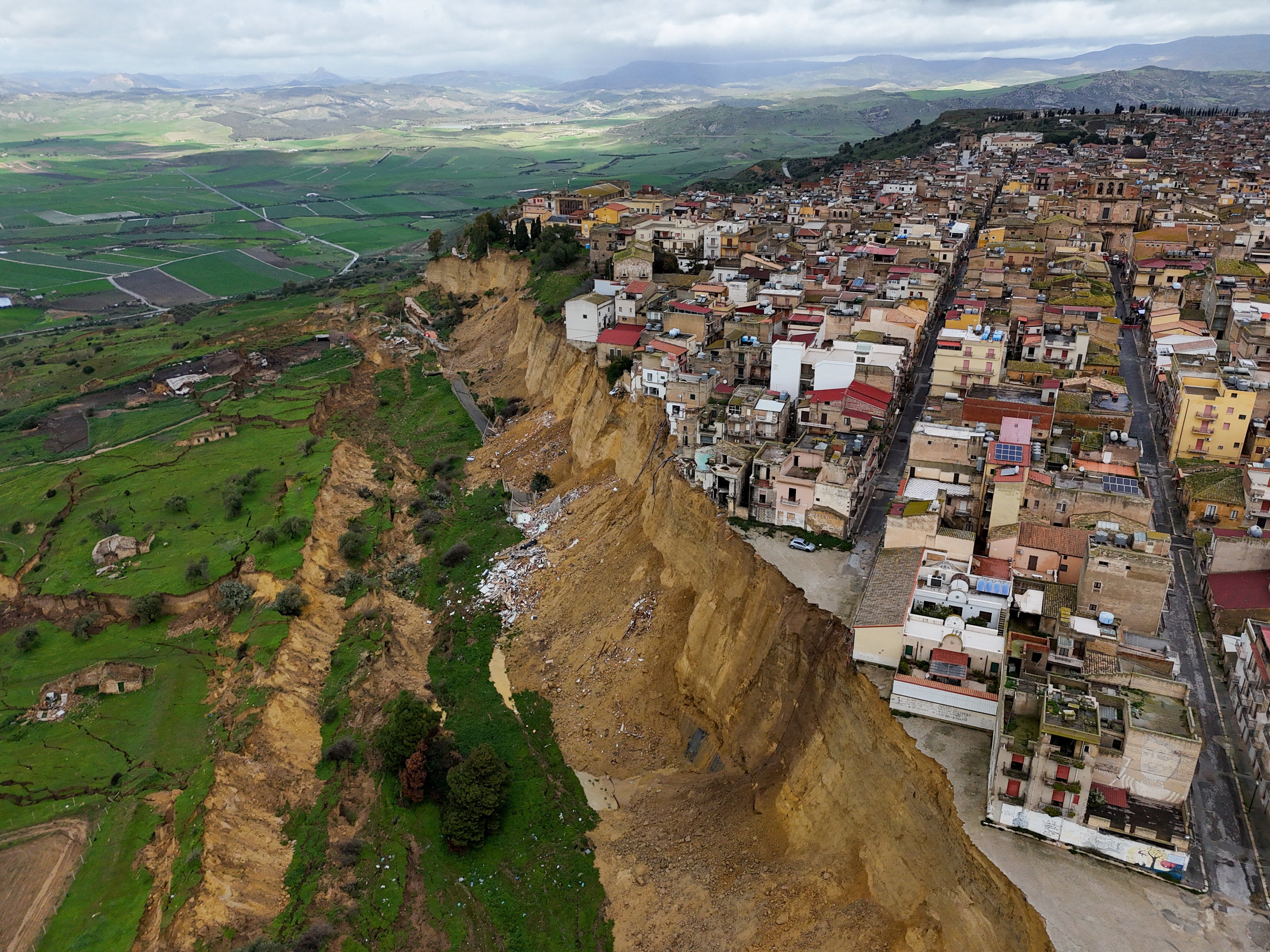 Homes and businesses destroyed by landslide in Italy