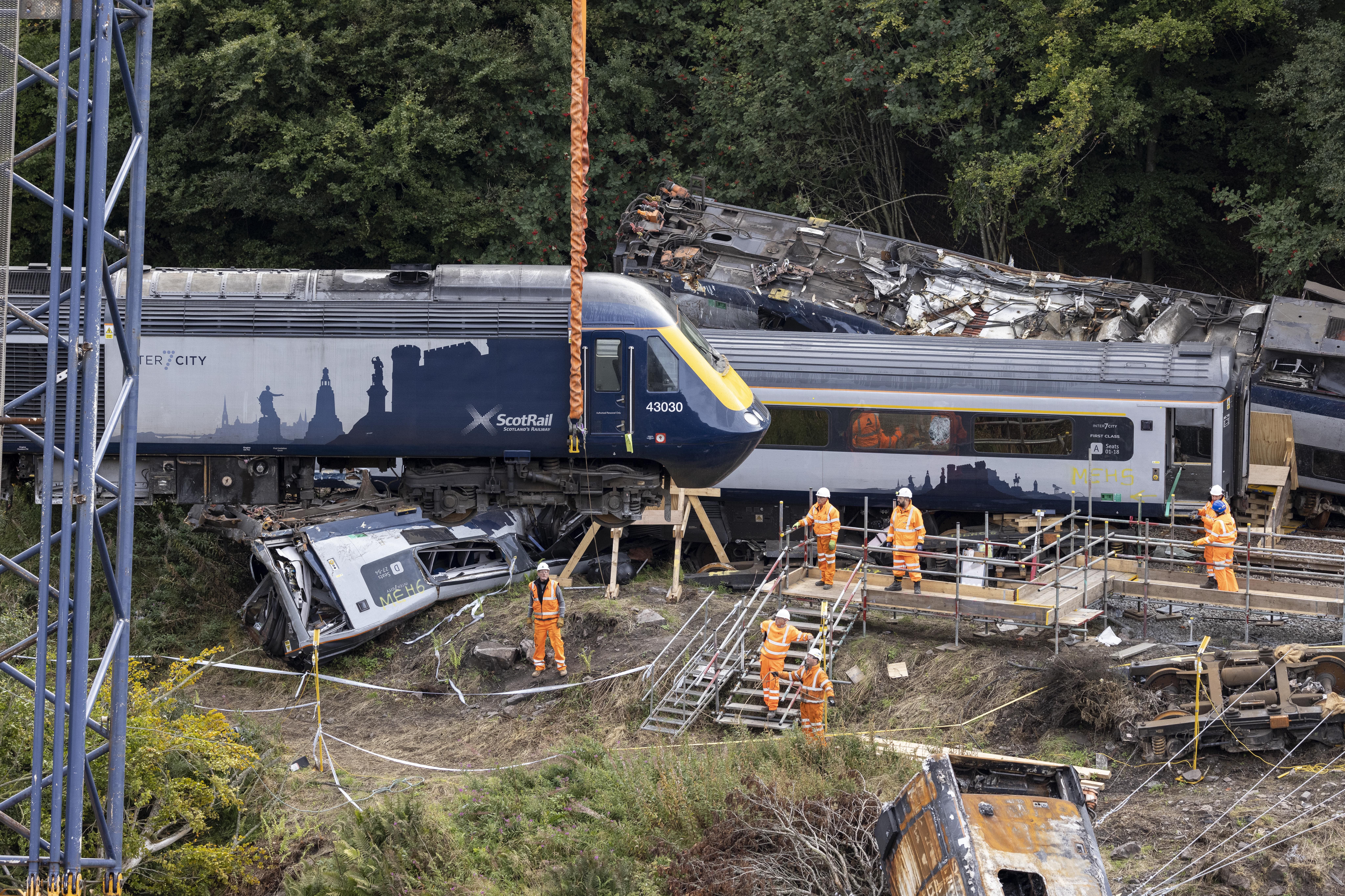 The train derailed after hitting debris that had been washed on to the tracks by heavy rain (Derek Ironside/Newsline Media/PA)