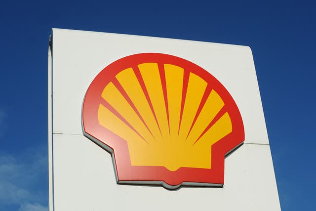 Shell is expected to reveal annual earnings slumped by more than a fifth last year (PA)