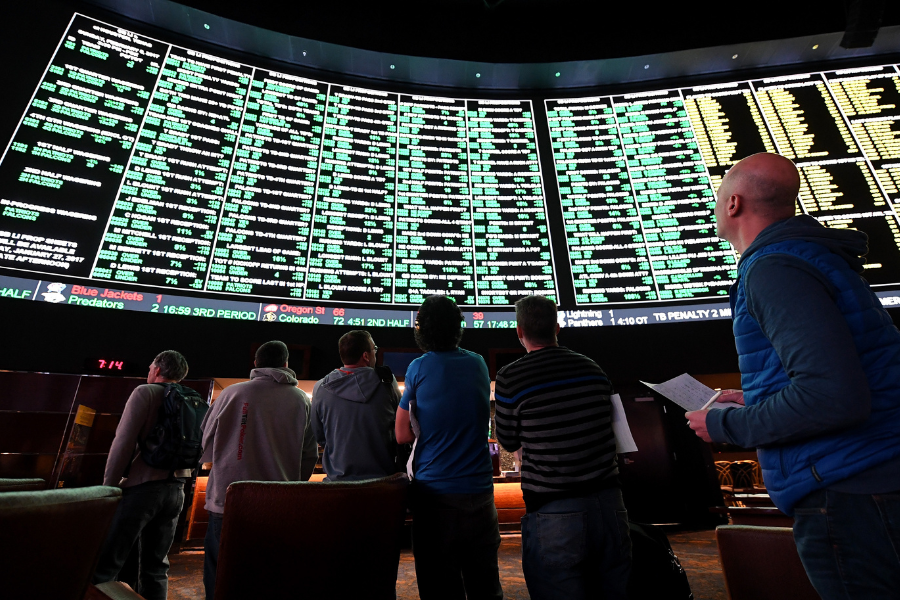Americans are betting record amounts on the Super Bowl - up nearly 30% from last year